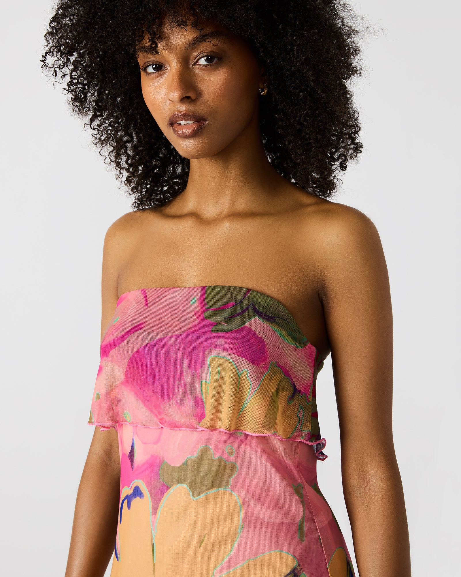 Close-up of floral print and mesh overlay on Bryar dress