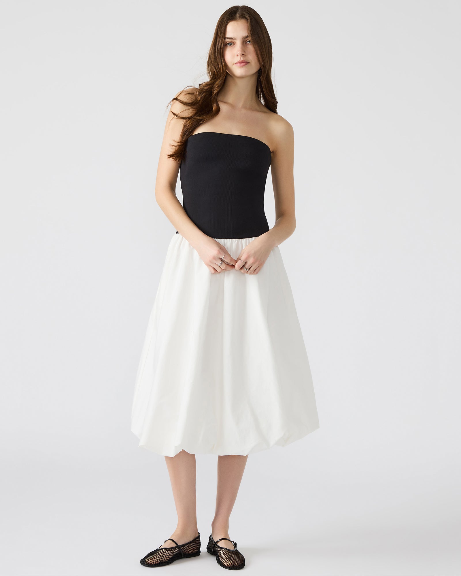 Oliver black strapless dress front view, showcasing the bubble skirt