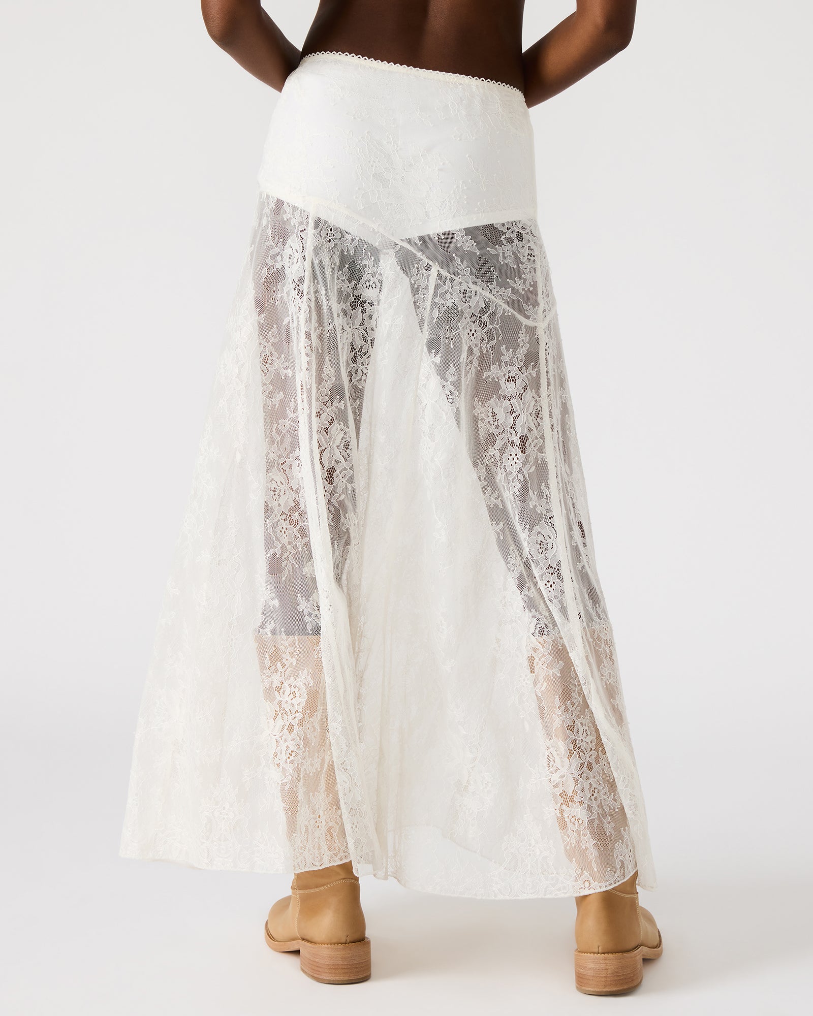 Close-up of the delicate lace details on the Veera maxi skirt.