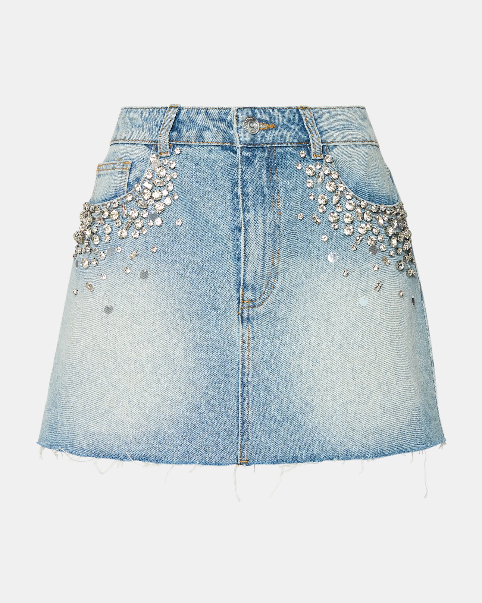 Model wearing ERAS denim mini skirt with rhinestones, standing outdoors