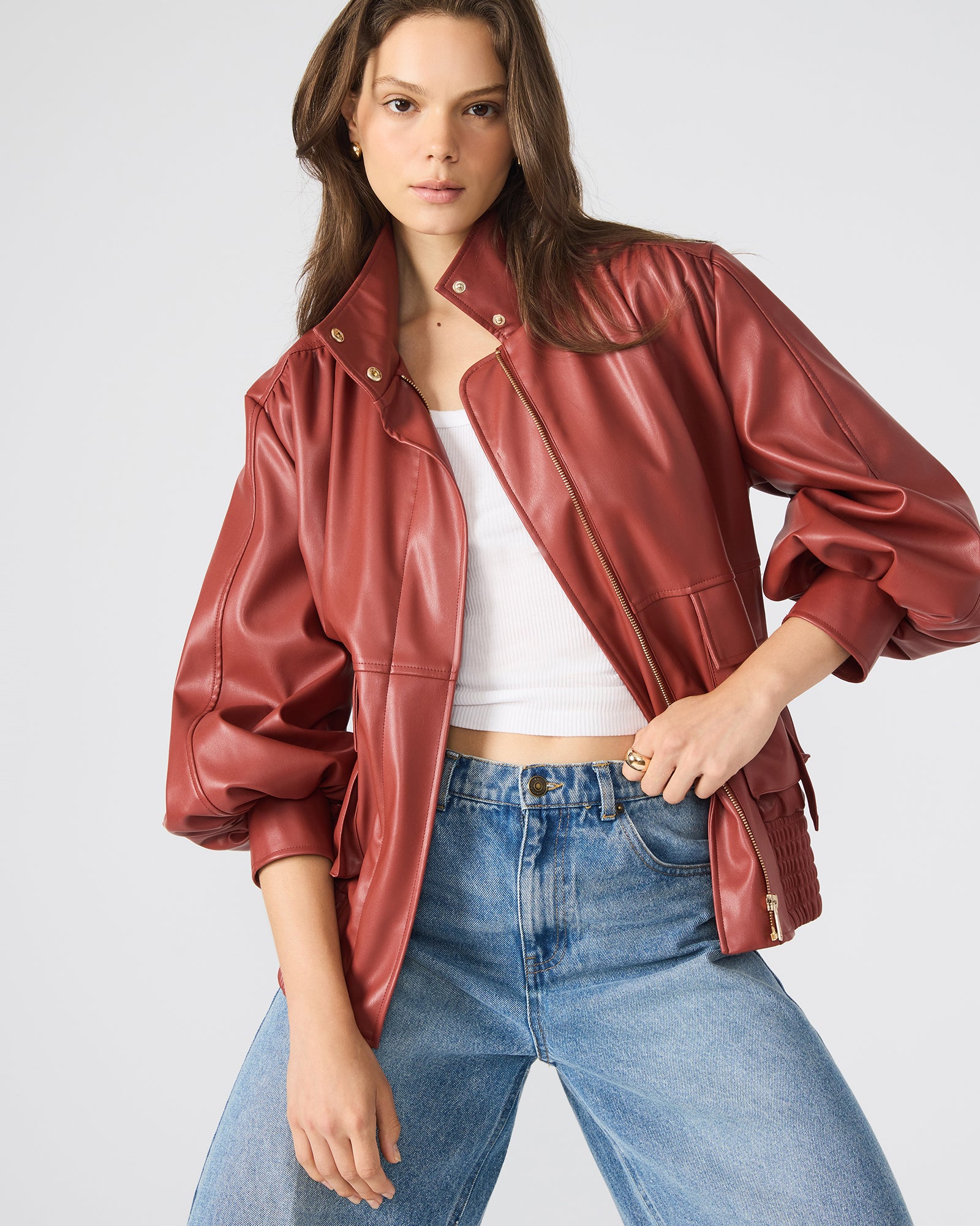 Front view of the Dusty Brick Faux Bomber Leather Jacket on a model.