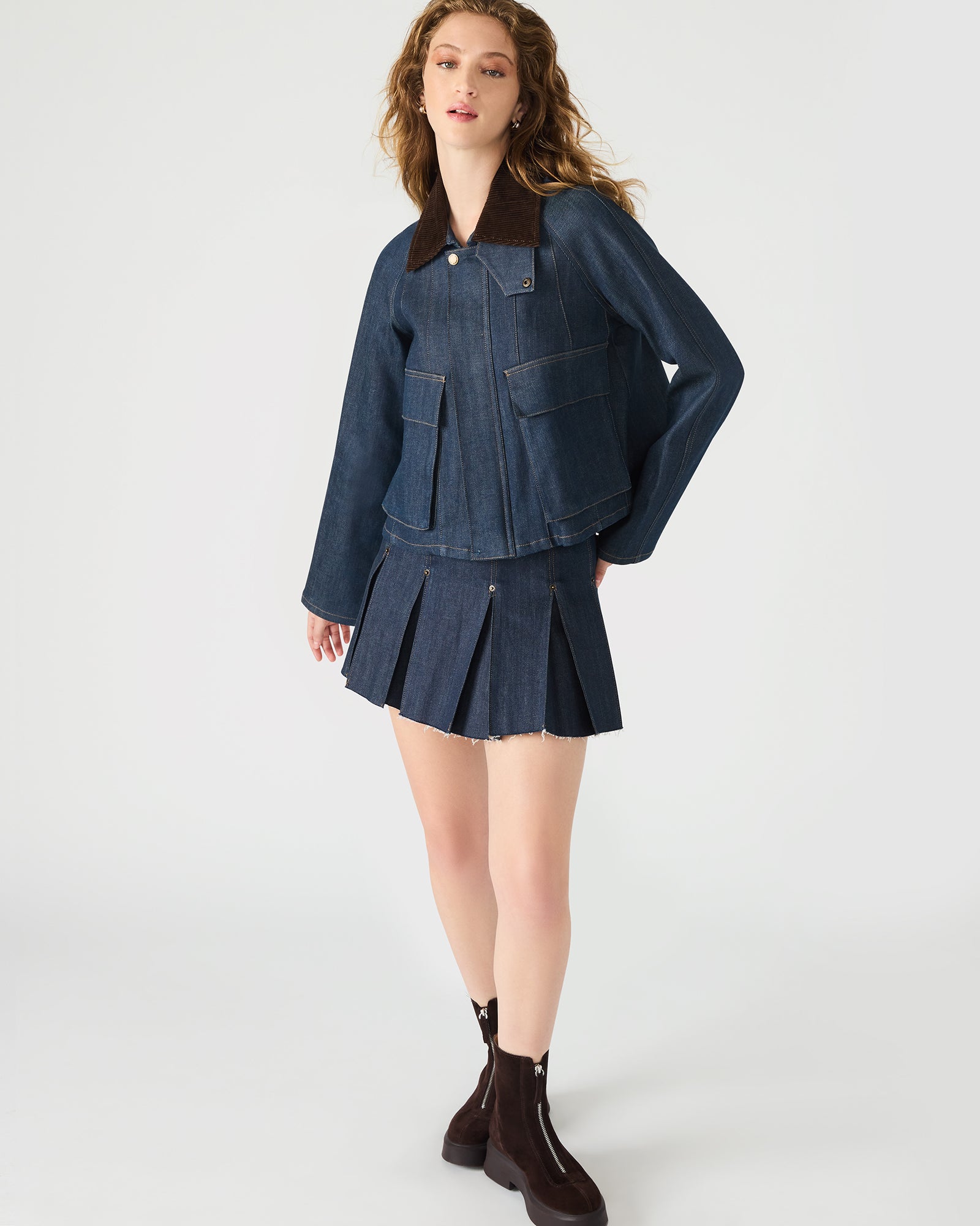 Lifestyle shot of a model wearing the denim jacket, styled for a casual day out.
