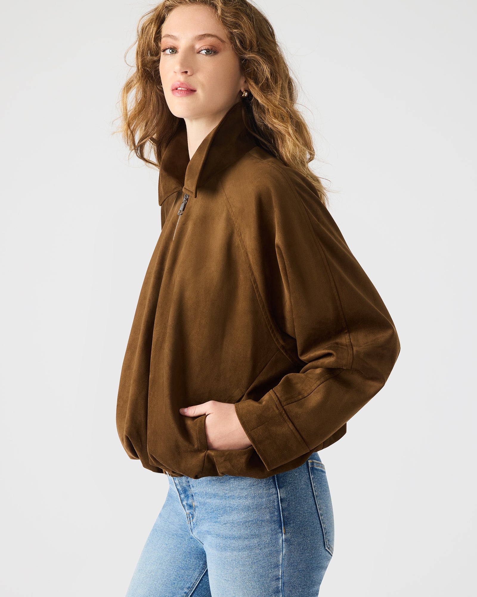 Rear angle of jacket showing tailored fit and long sleeves