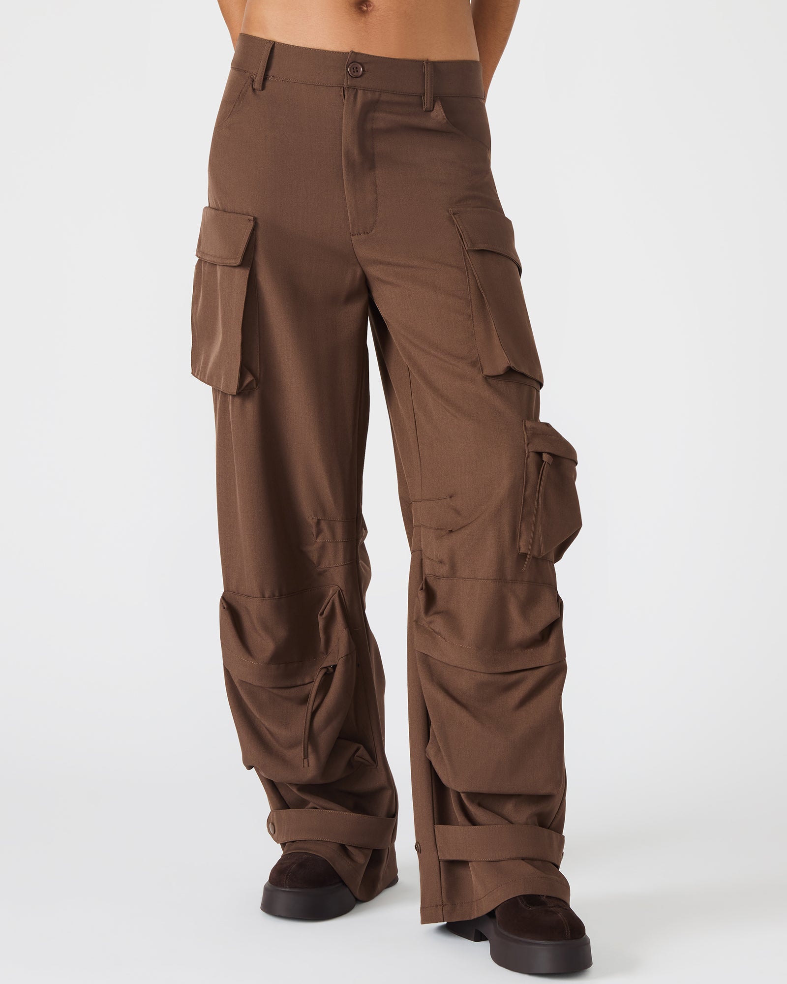 Back angle featuring patch pockets and adjustable ankle strap
