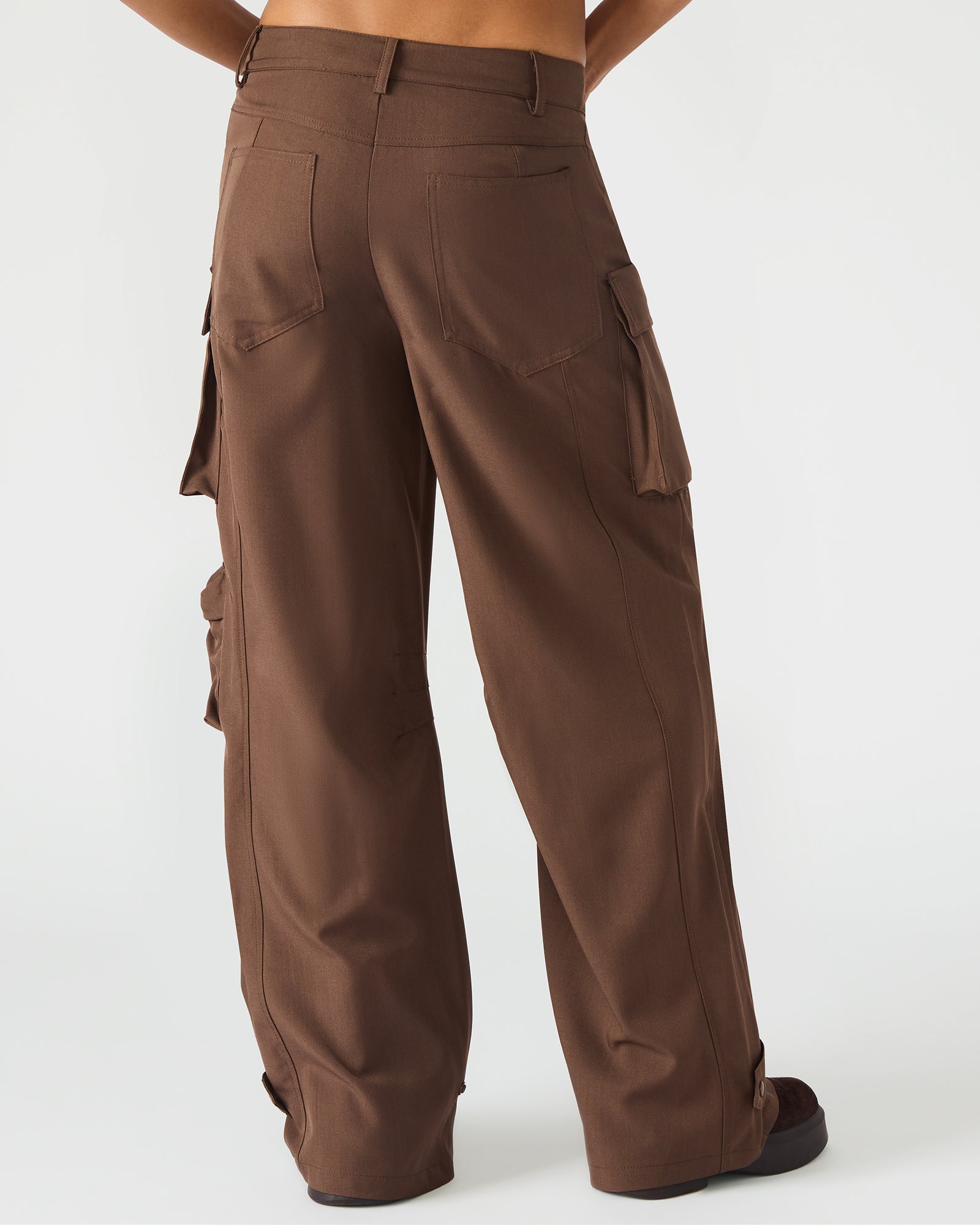 Side view showing wide leg silhouette and dual cargo pockets near knee