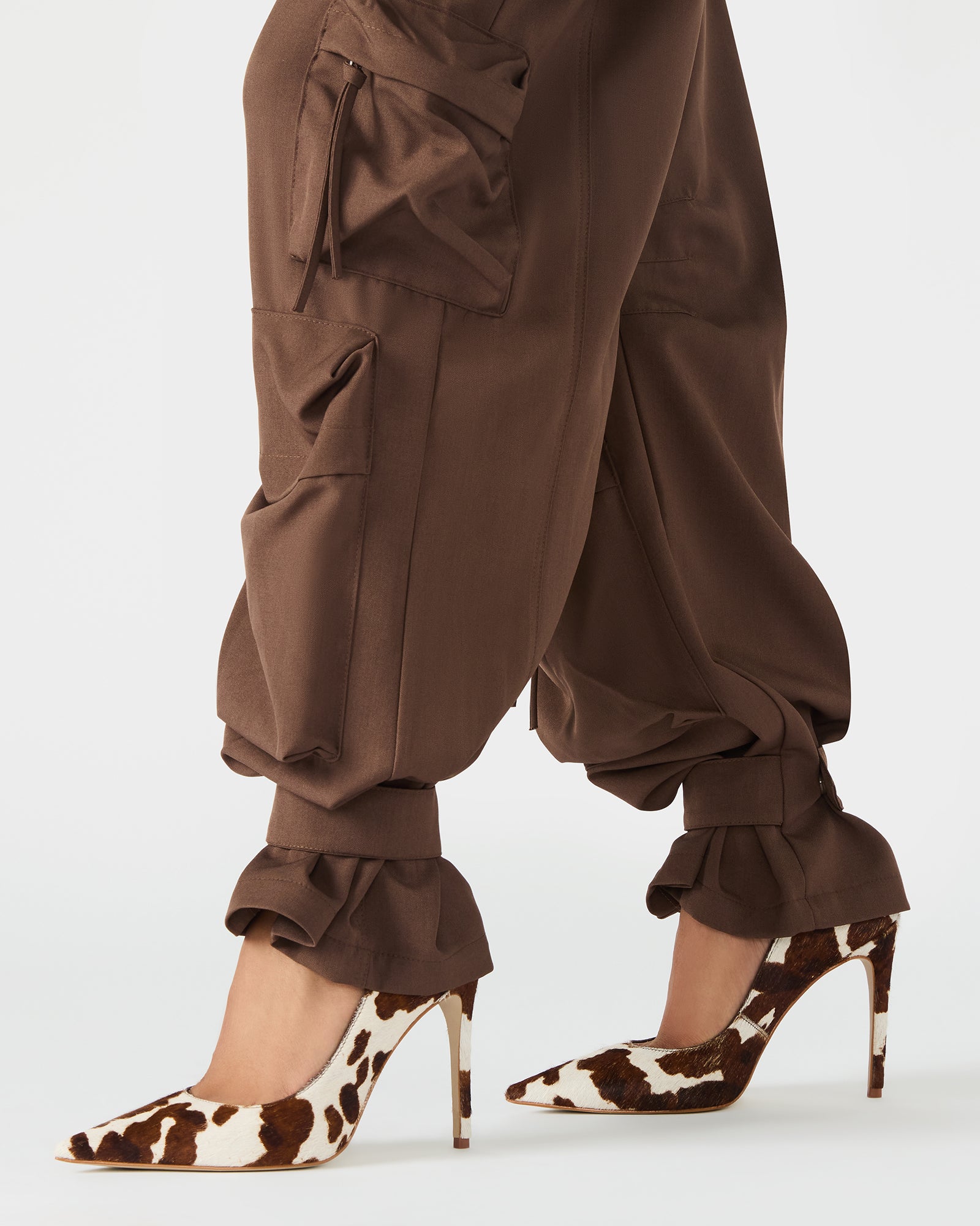 Back angle featuring patch pockets and adjustable ankle strap