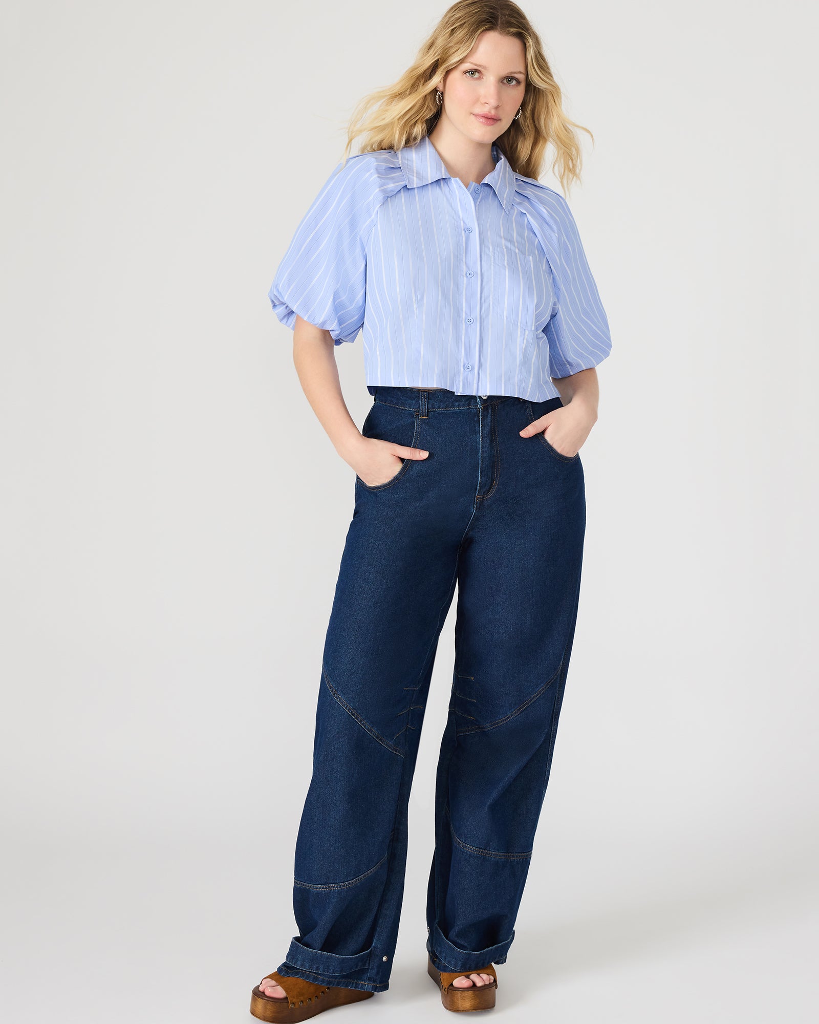 Close-up of blue cotton crop top showcasing button details