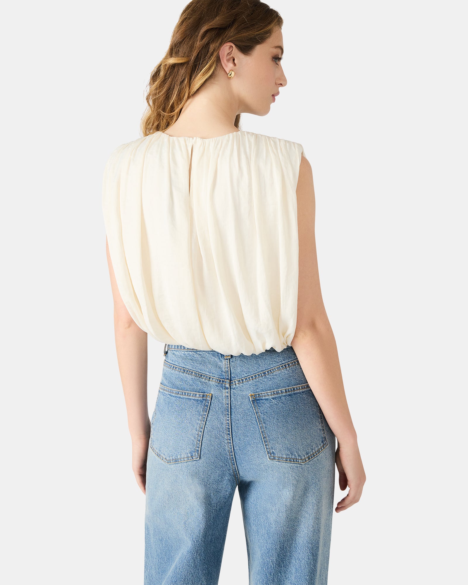 Close-up of the Milana top showing pleated and bubble silhouette details
