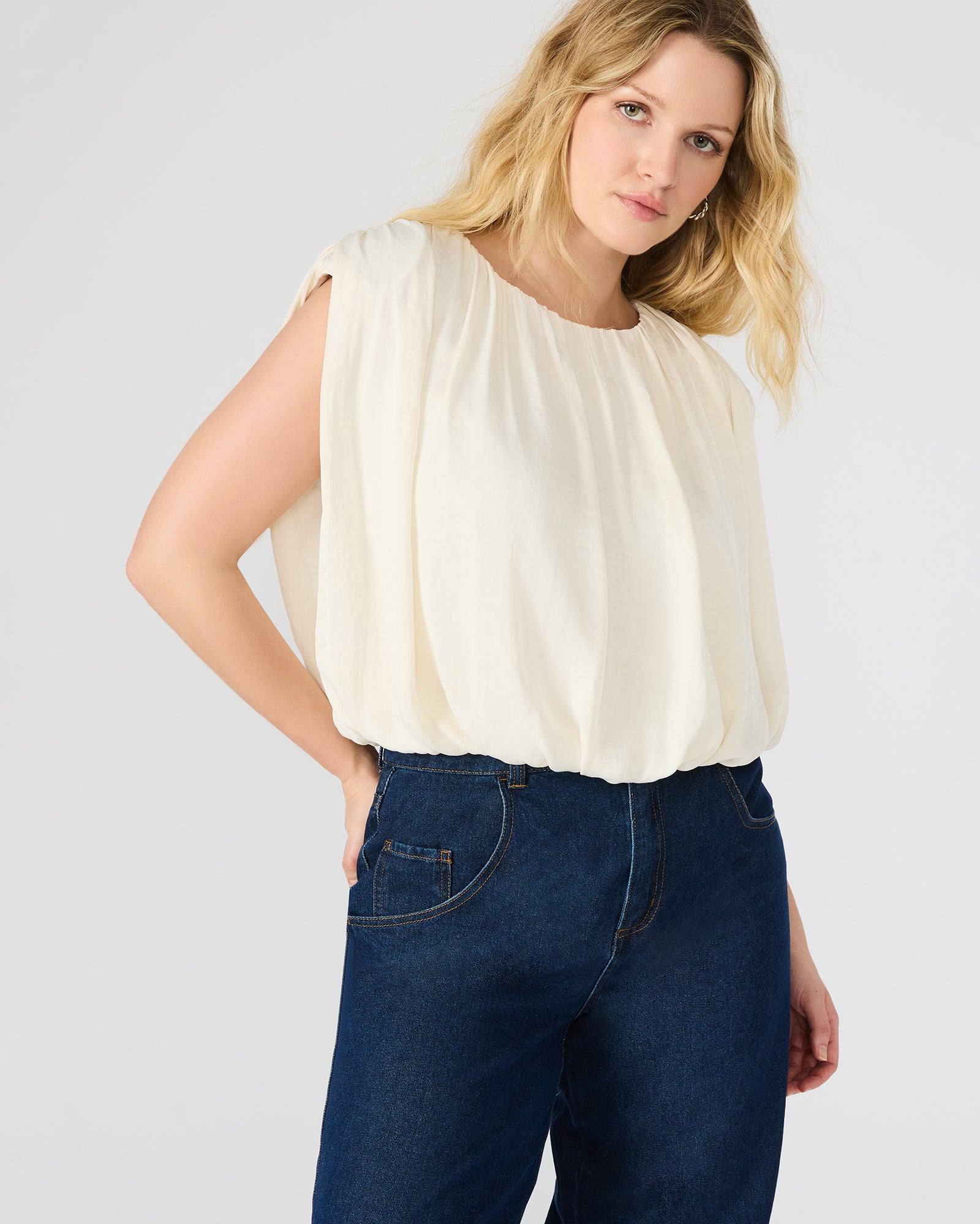 Full view of the vintage boho tops with elastic hem and sleeveless design