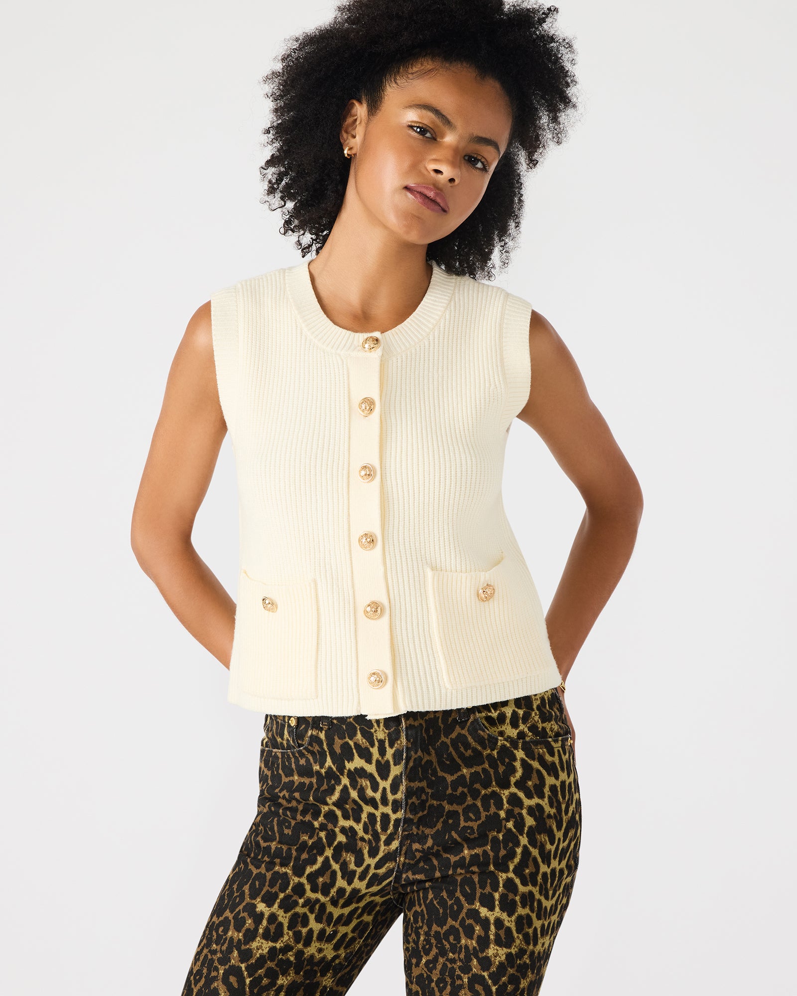 Detail shot of gold buttons and texture on the womens heated vest