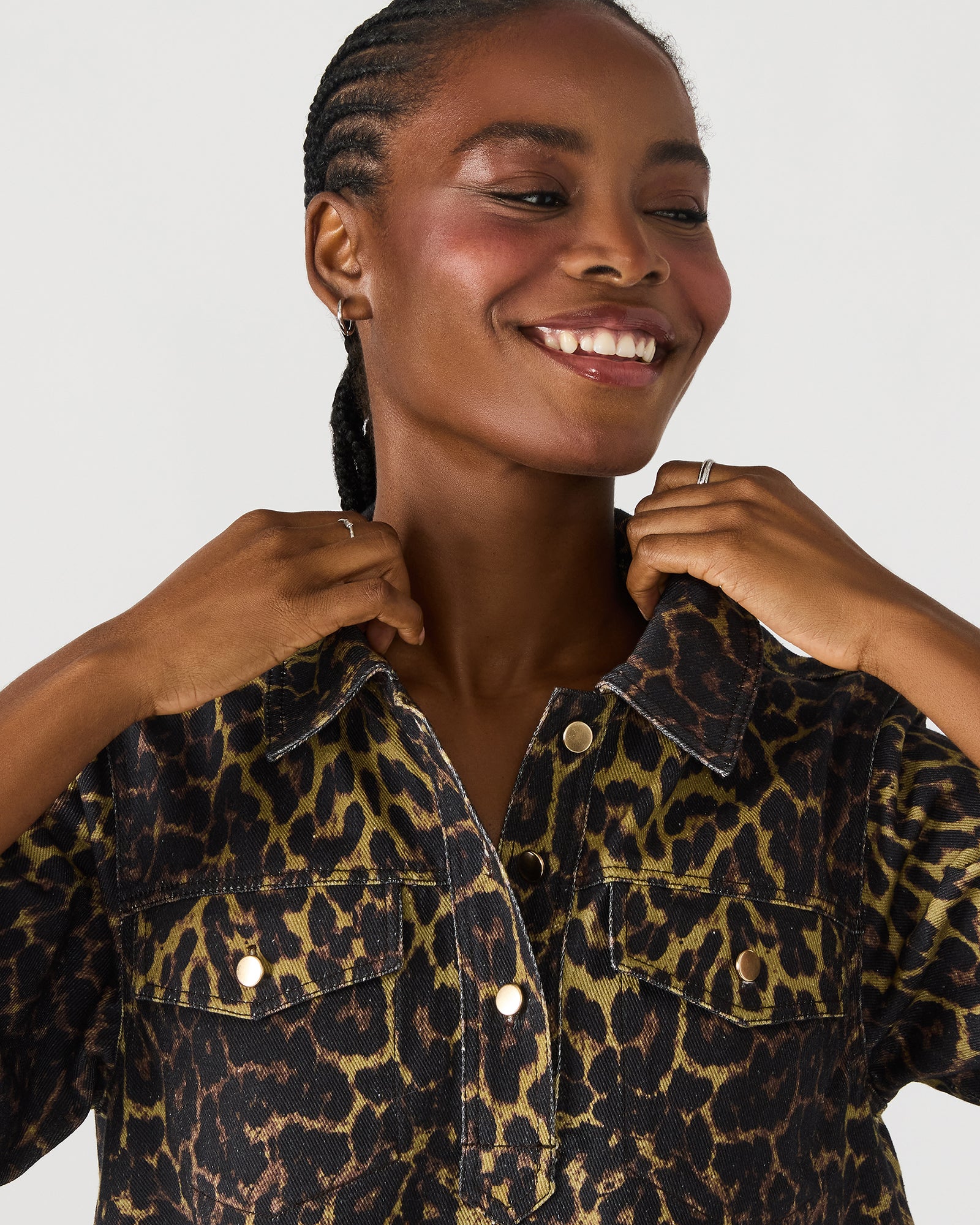 Model wearing the casual denim dress with button-up design and collar