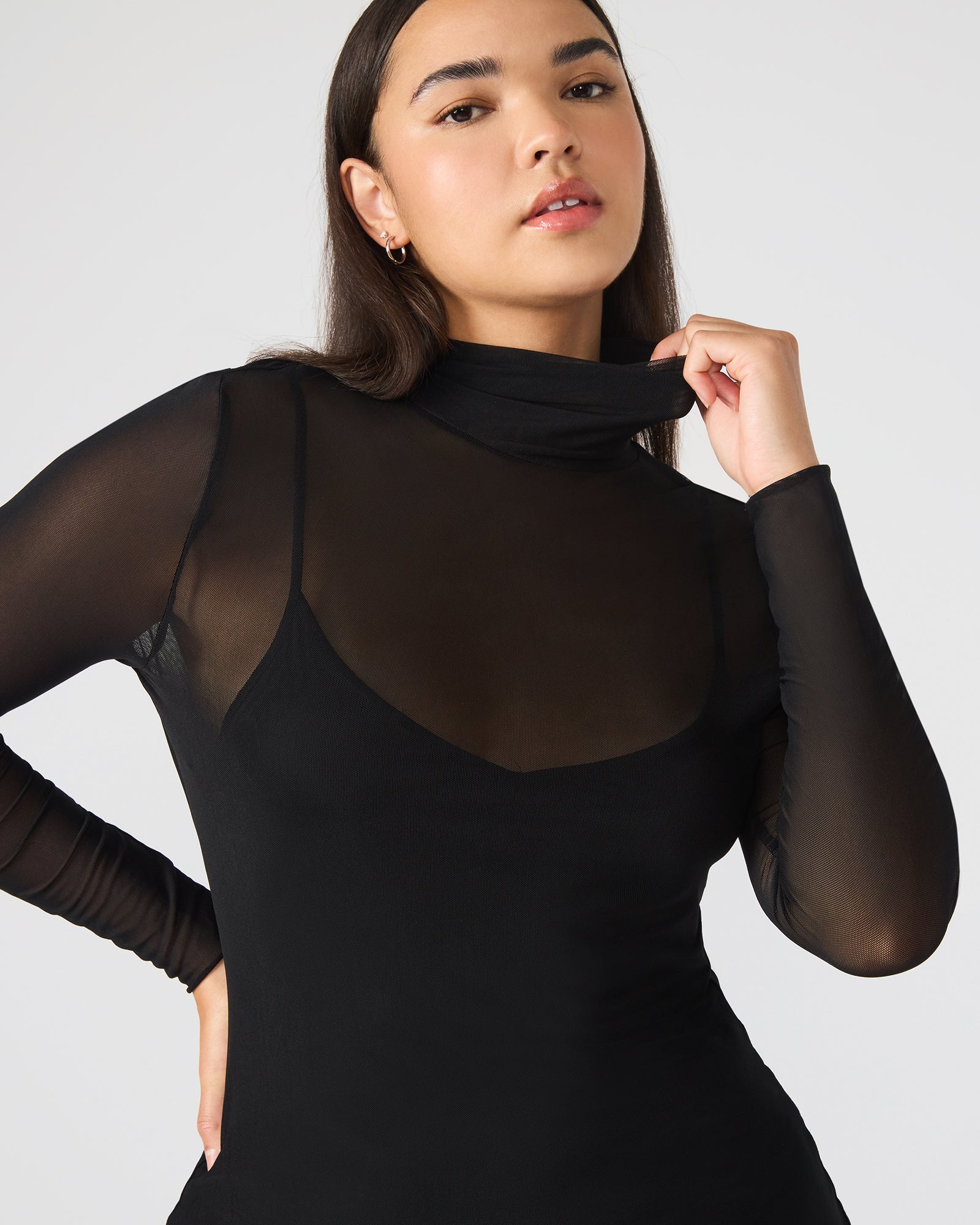 Close-up of the mock neck detail on the Hailee black midi dress