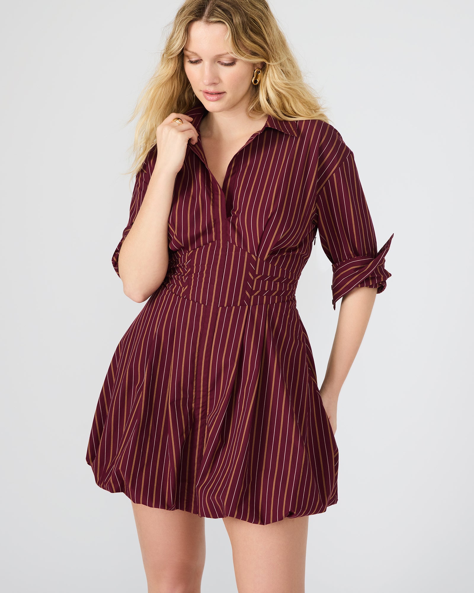 Close-up of the fabric texture of the wine colored bridesmaid dresses.