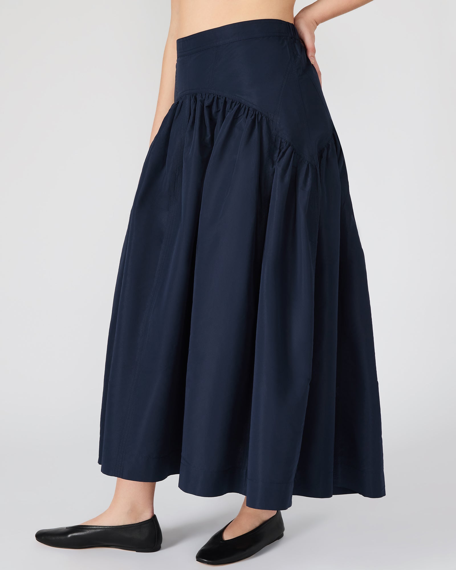 Flowy maxi skirt back detail showing zipper closure
