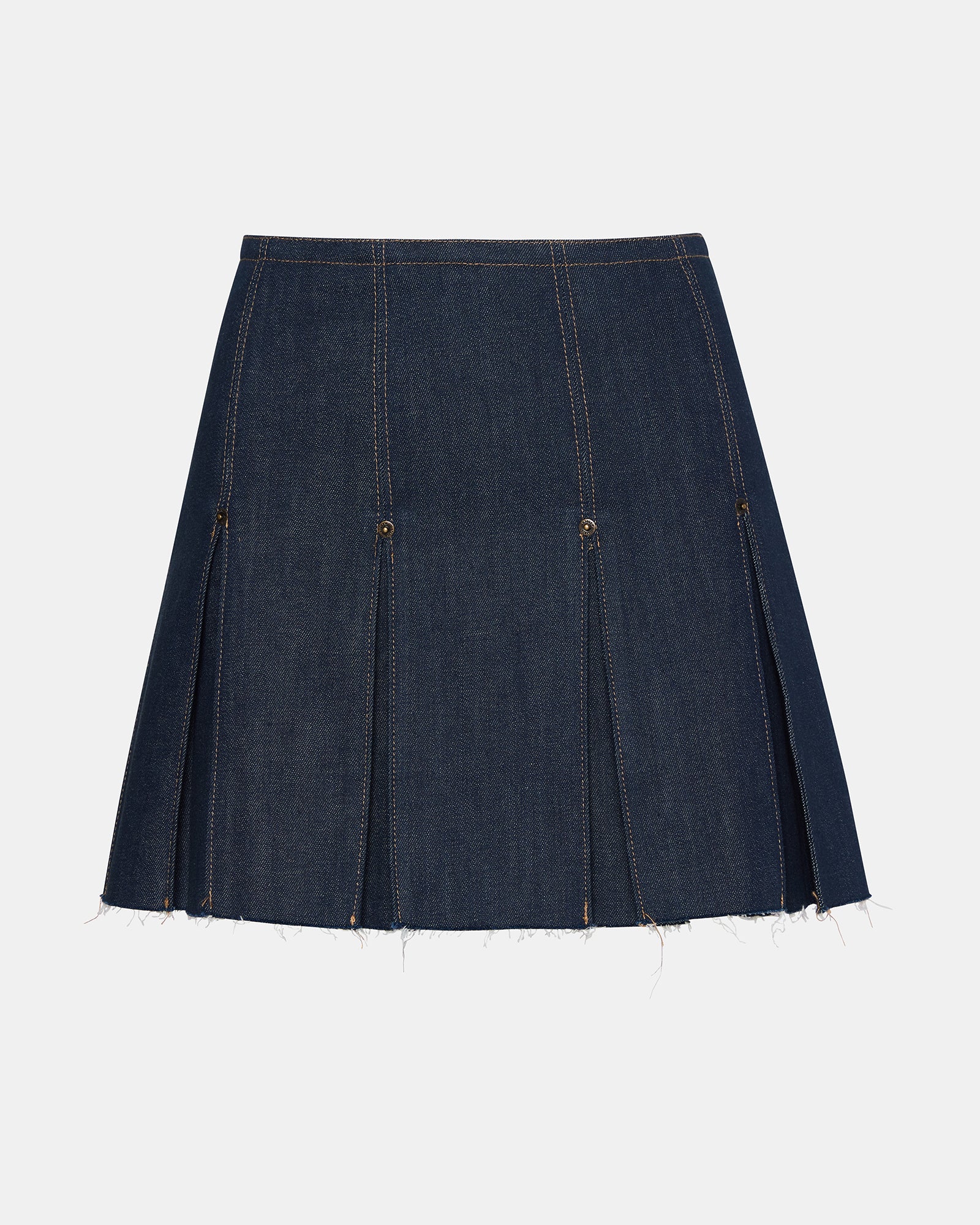 Close-up of the Joan pleated denim mini skirt in deep indigo showing the pleats and texture