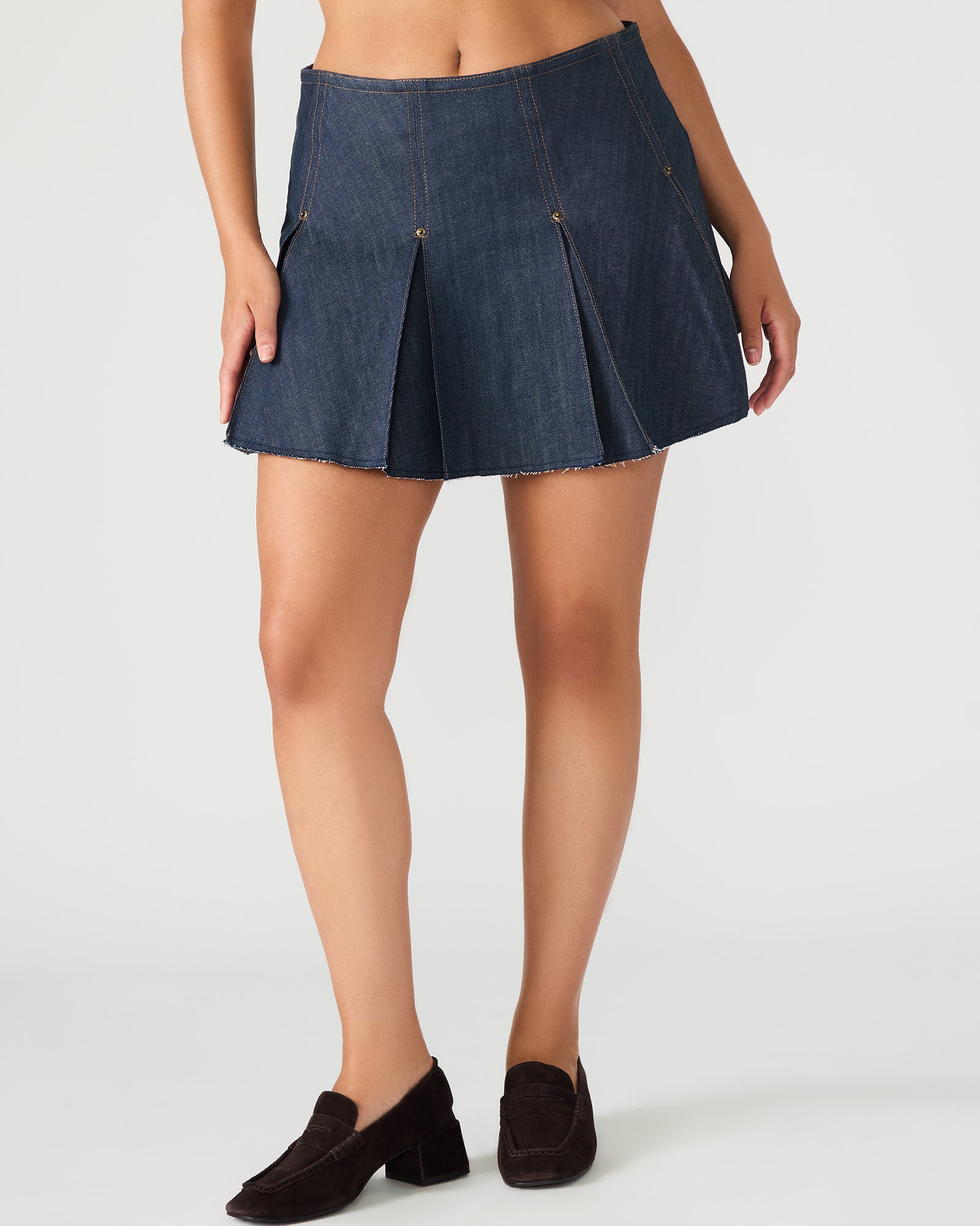 Side view of the Joan skirt highlighting the back zipper closure and fit