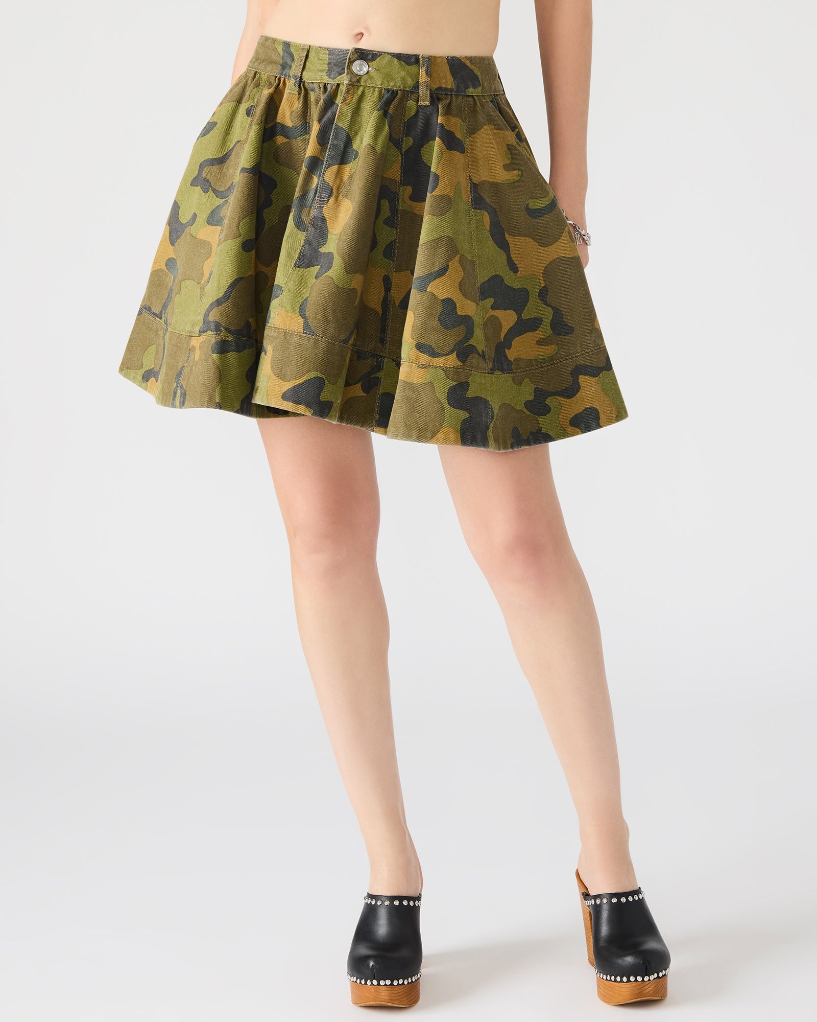 Side view showcasing the flattering fit of the Sloan denim skirt.