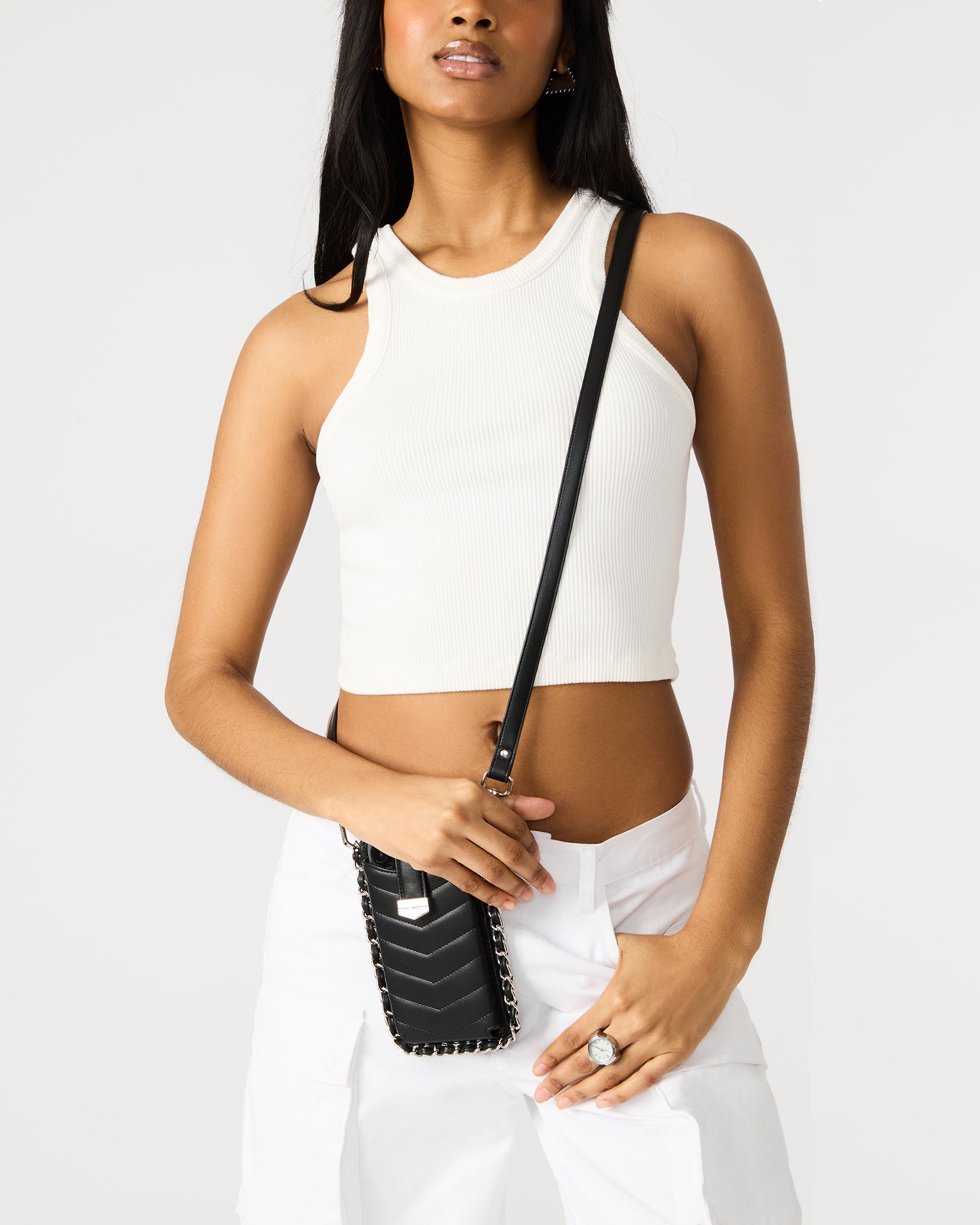 Front view of the sleek phone crossbody bag showcasing the chevron quilting.