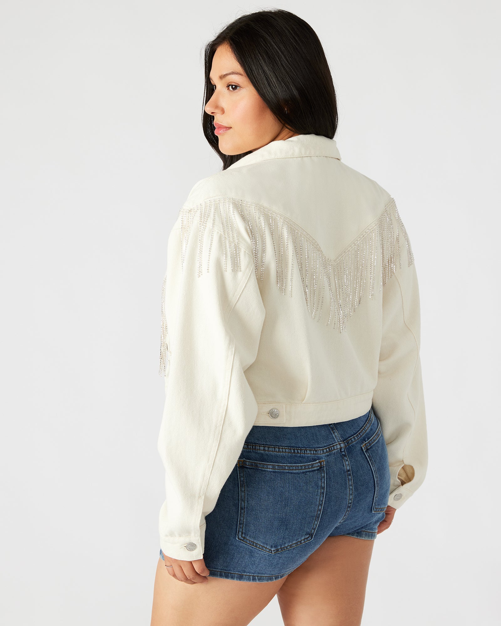 Close-up of rhinestone details on Canyon cropped denim jacket