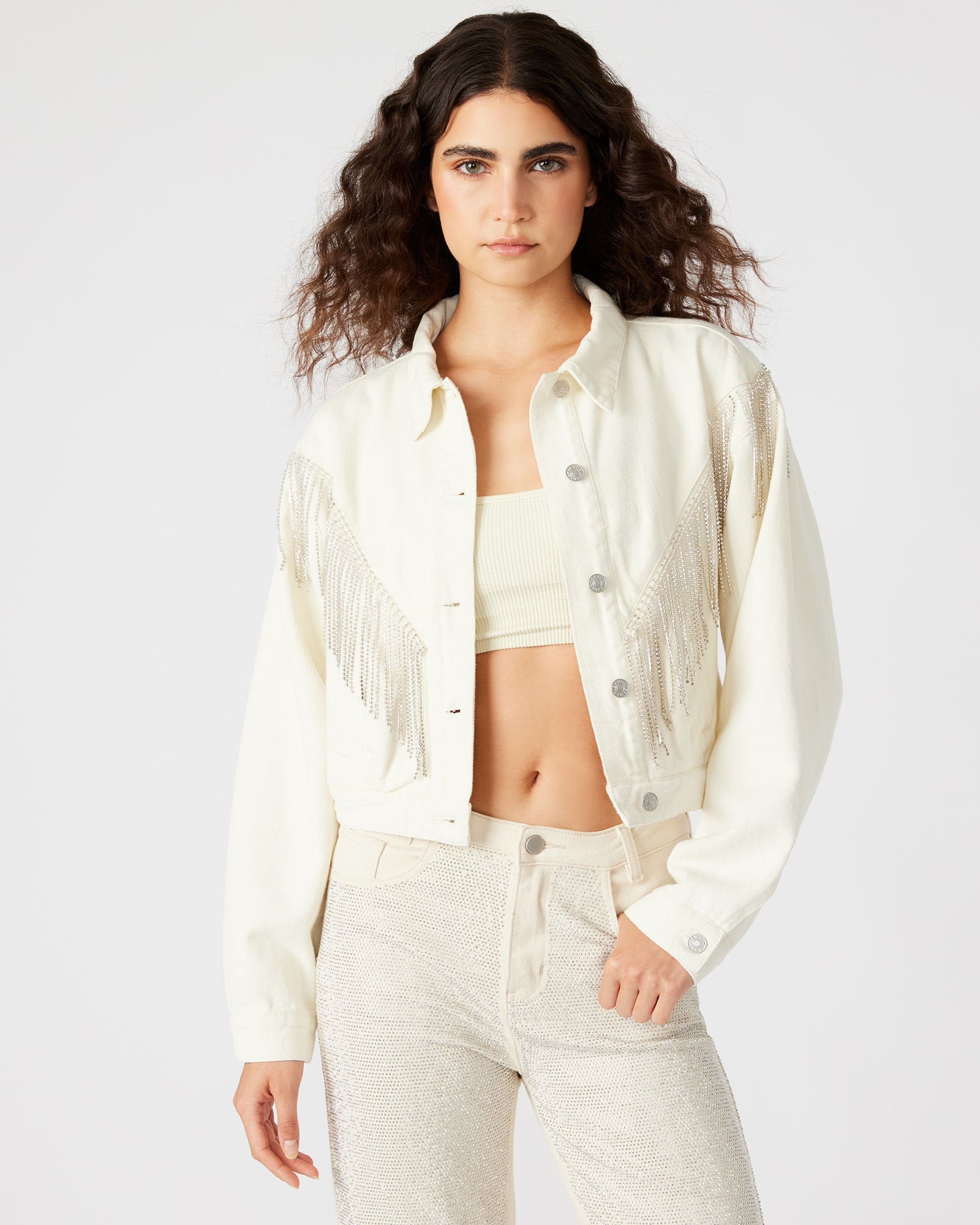 Front view of Canyon cropped denim jacket with rhinestone fringes