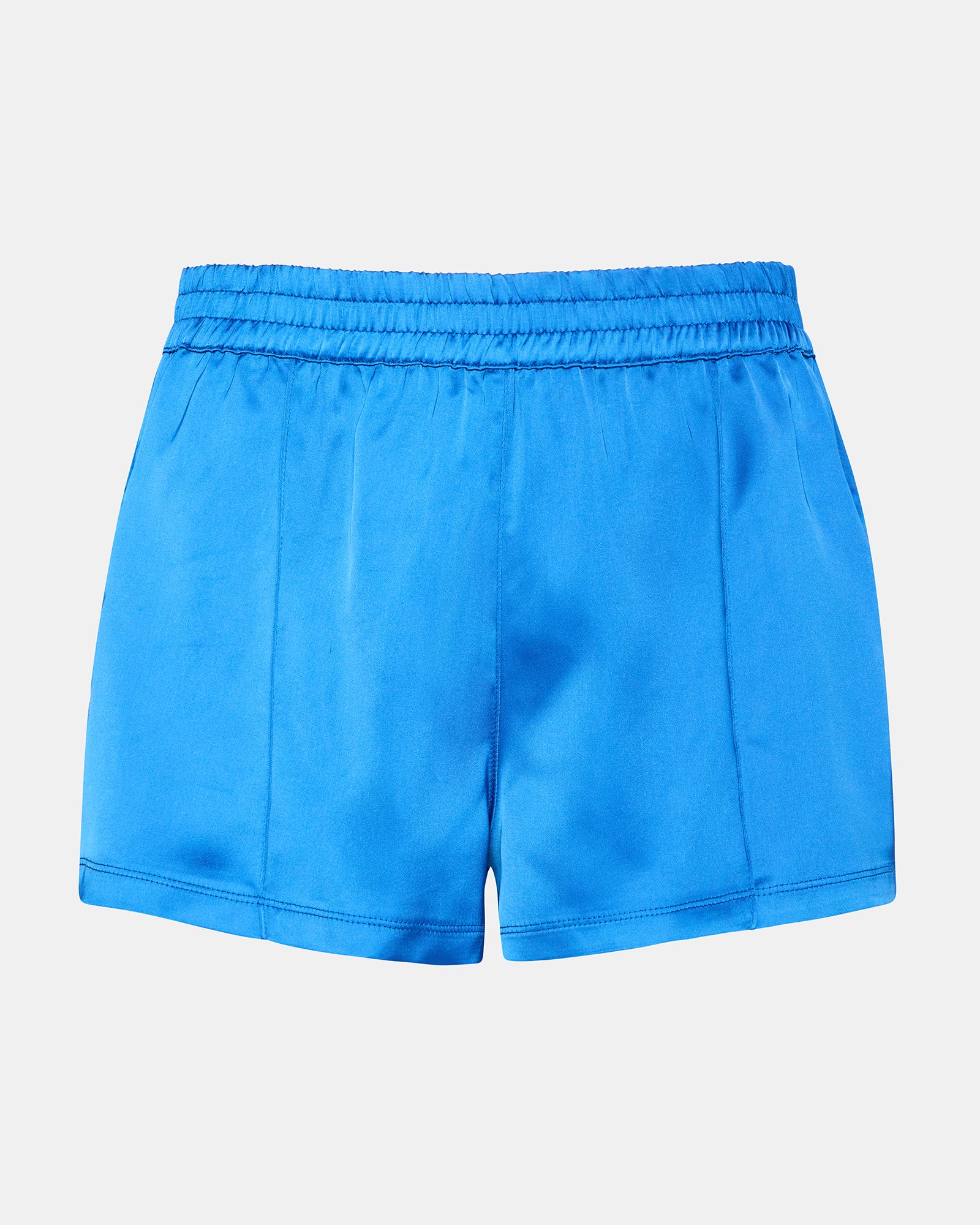 Front view of mens workout shorts with button detailing, shown outdoors near Seattle trail.