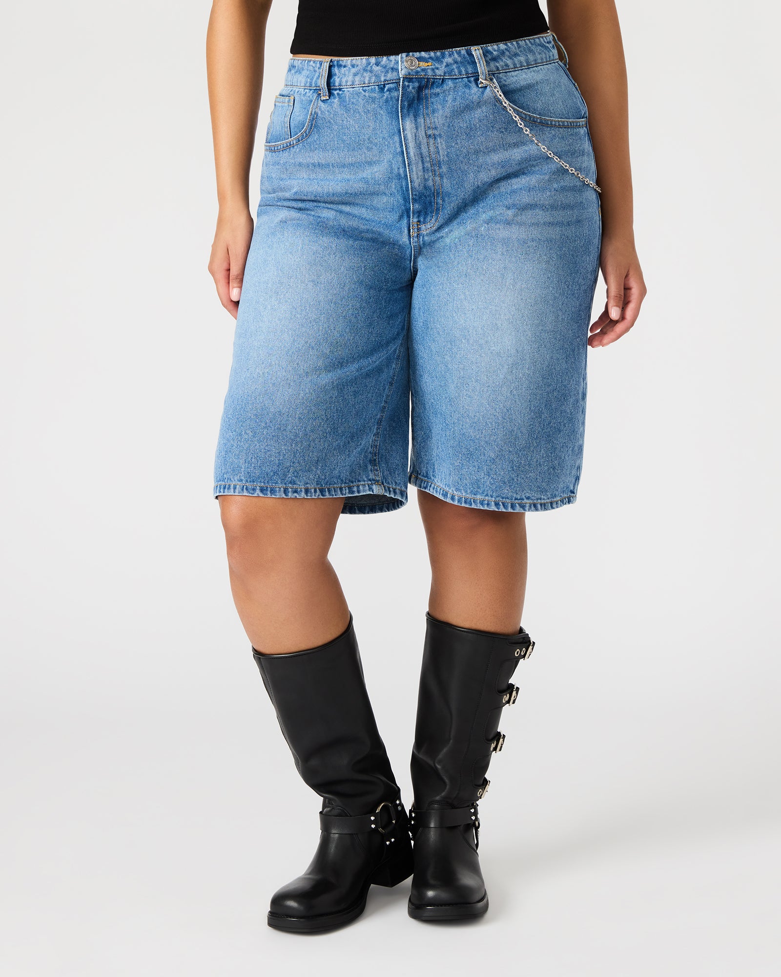 Casual outfit pairing featuring Magdalen jean shorts with a tucked-in blouse
