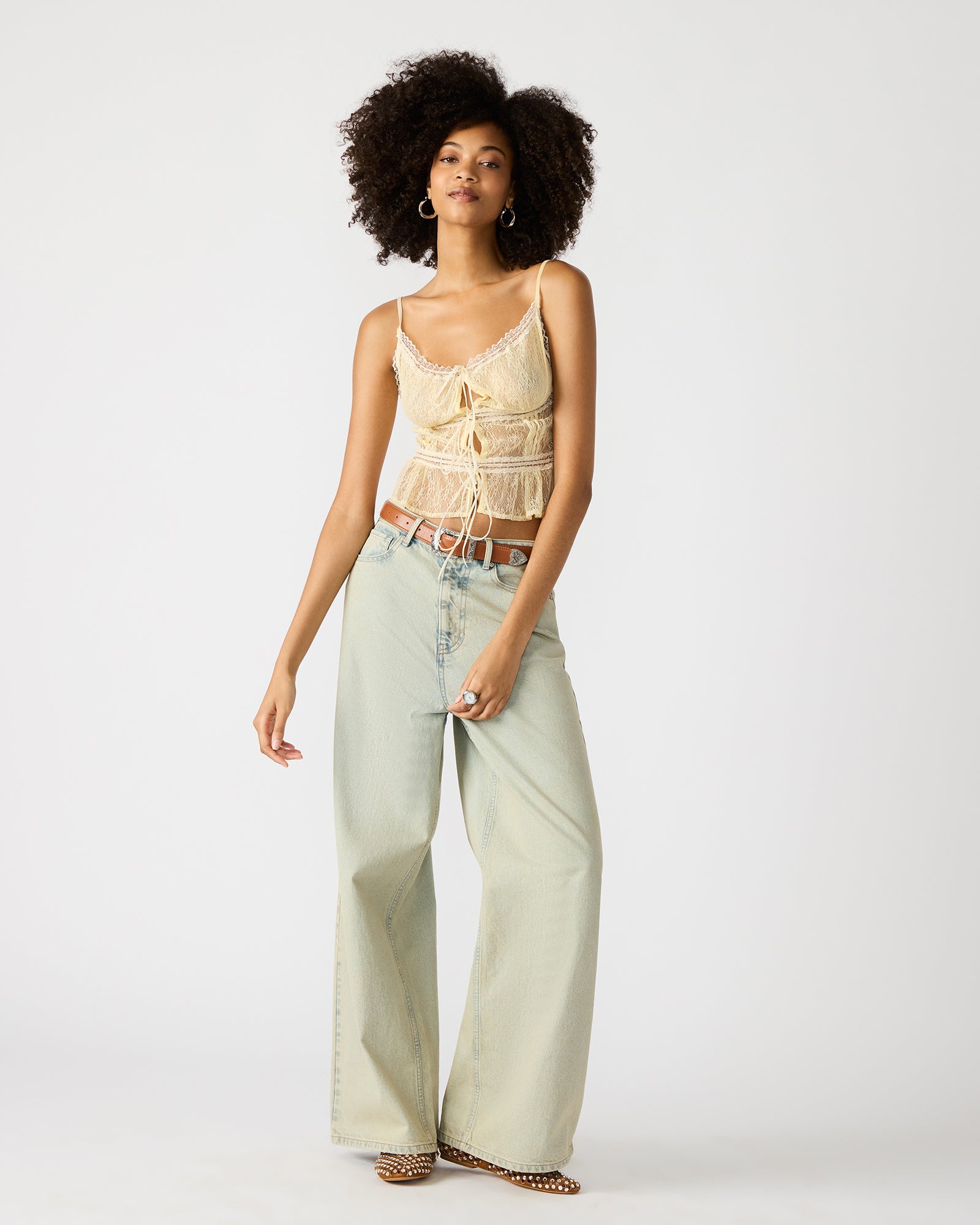 Front view of Magnus wide-leg denim jeans with pockets.