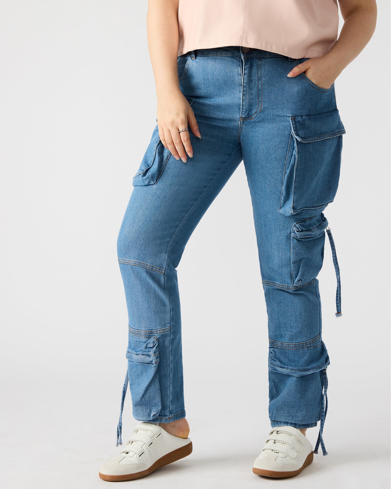 Casual outfit featuring black skinny jeans paired with a trendy top.