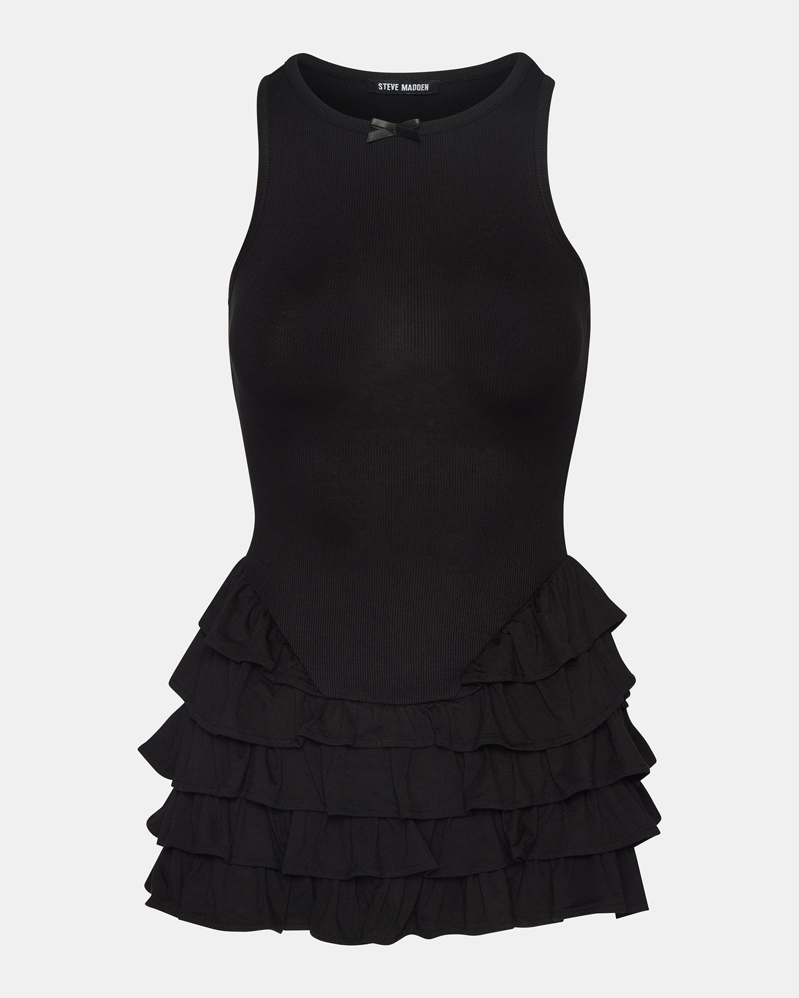 Side view of black dress with ruffled skirt worn outdoors