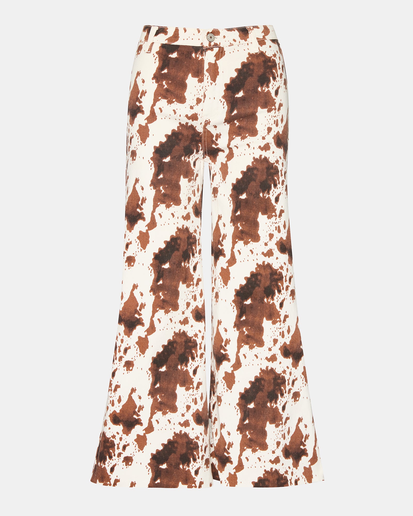 Side view of cow print jeans showing their stylish wide-leg design.