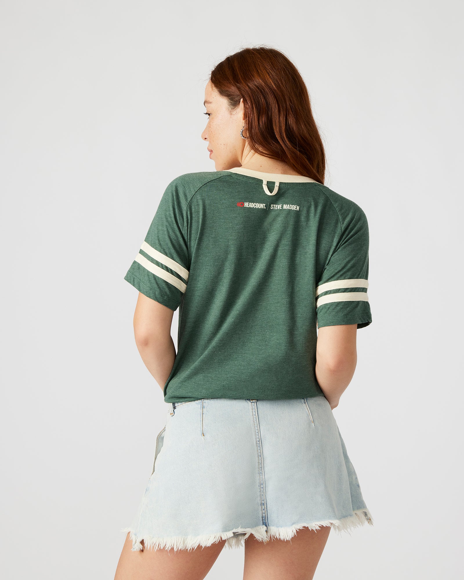 Side view of the Democracy manifest shirt, displaying its comfortable fit and contrast details.