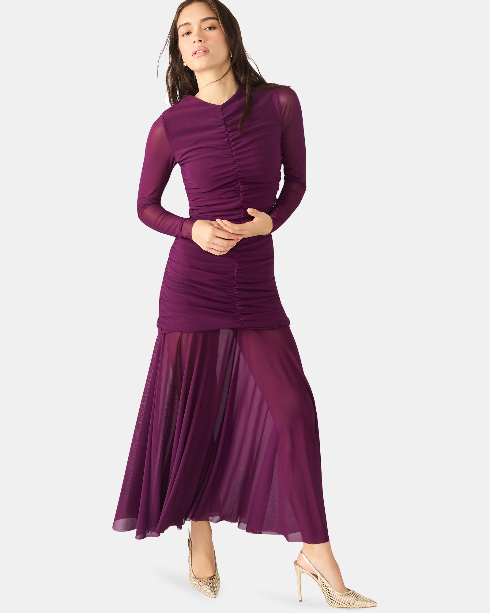 Front view of the Kiara long-sleeve mesh maxi dress in pink, showcasing its flowy design.
