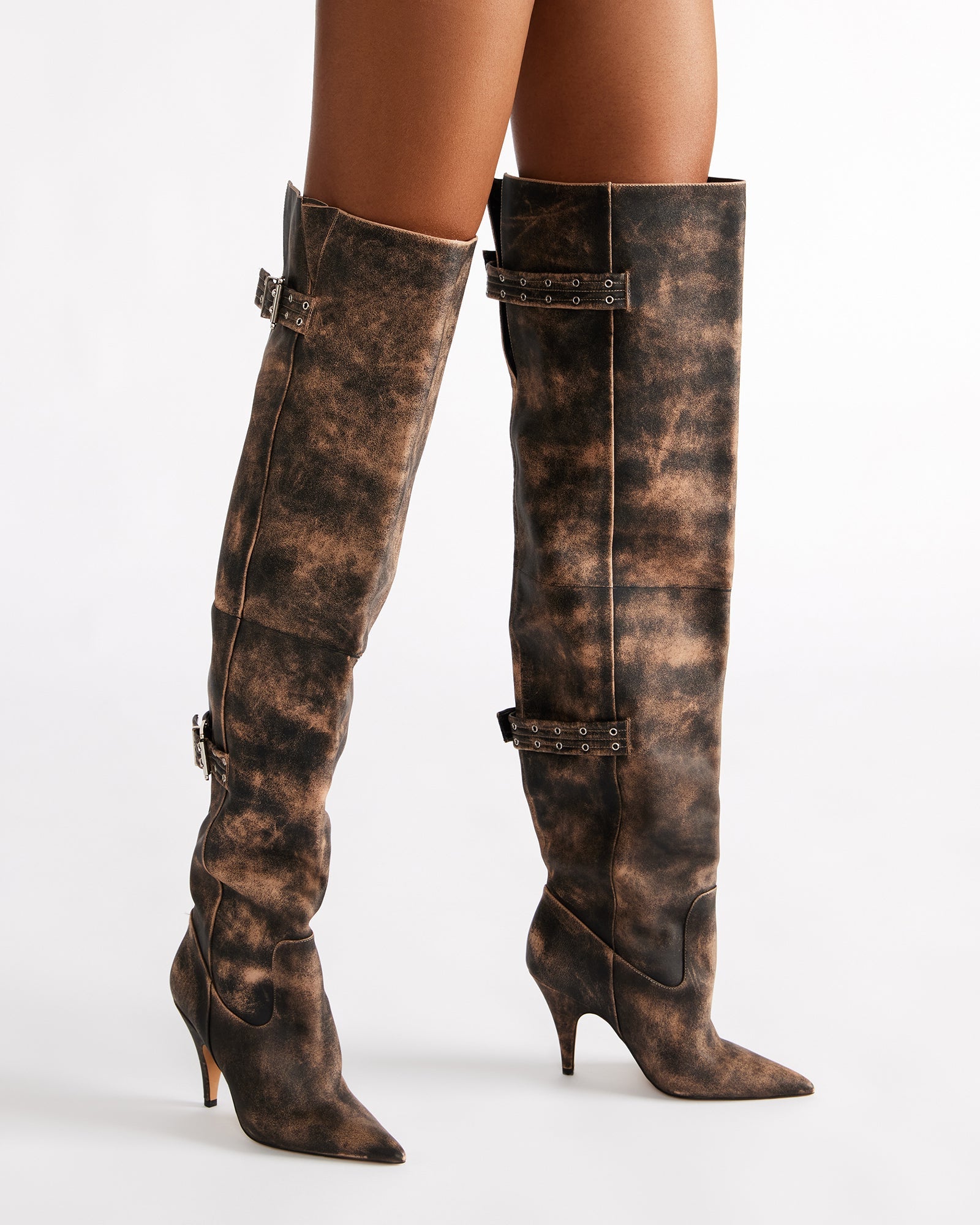 Close-up of shaft height and buckle detail on edgy over-the-knee boots