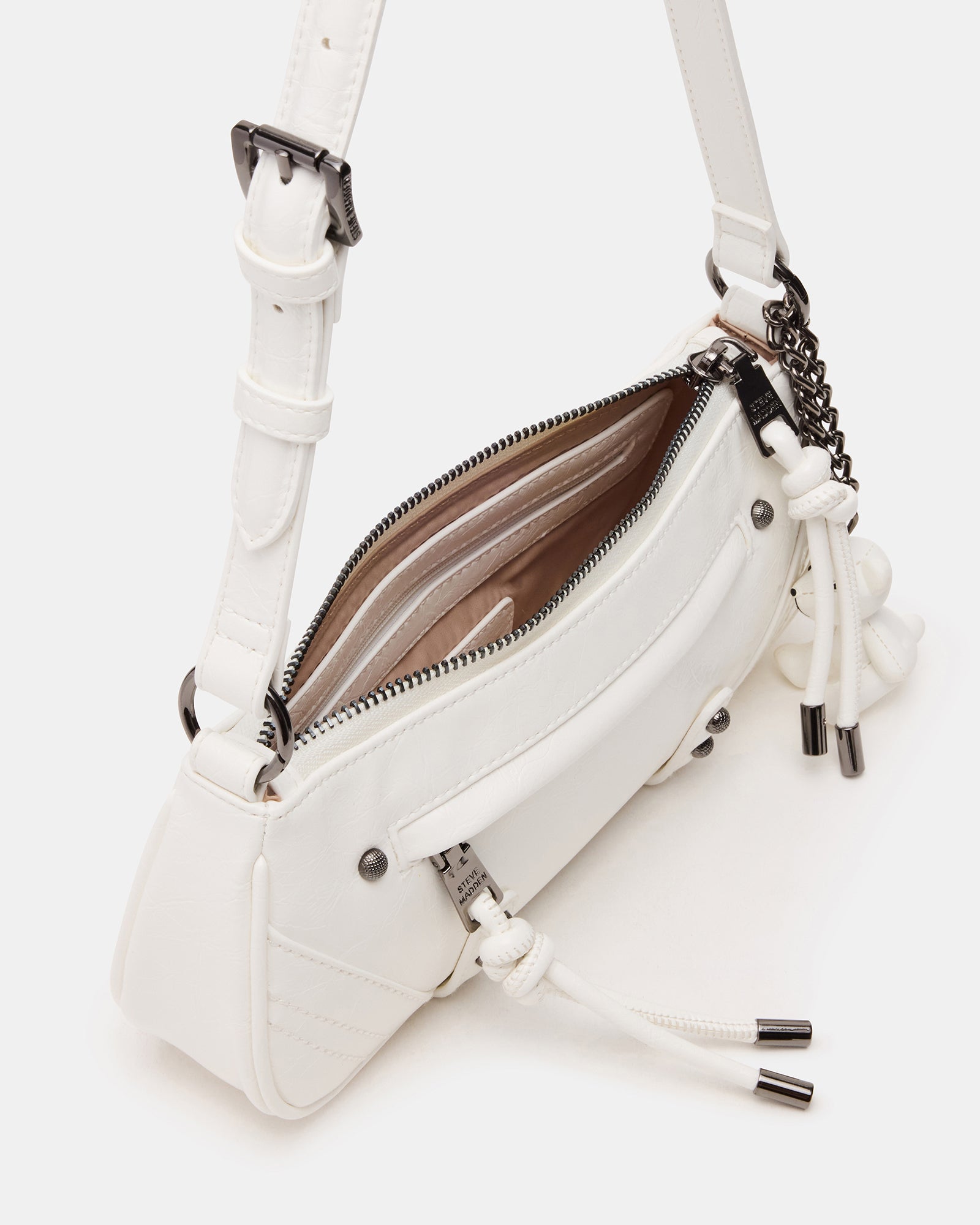 Front view of the Becka White crossbody bag with teddy bear charm