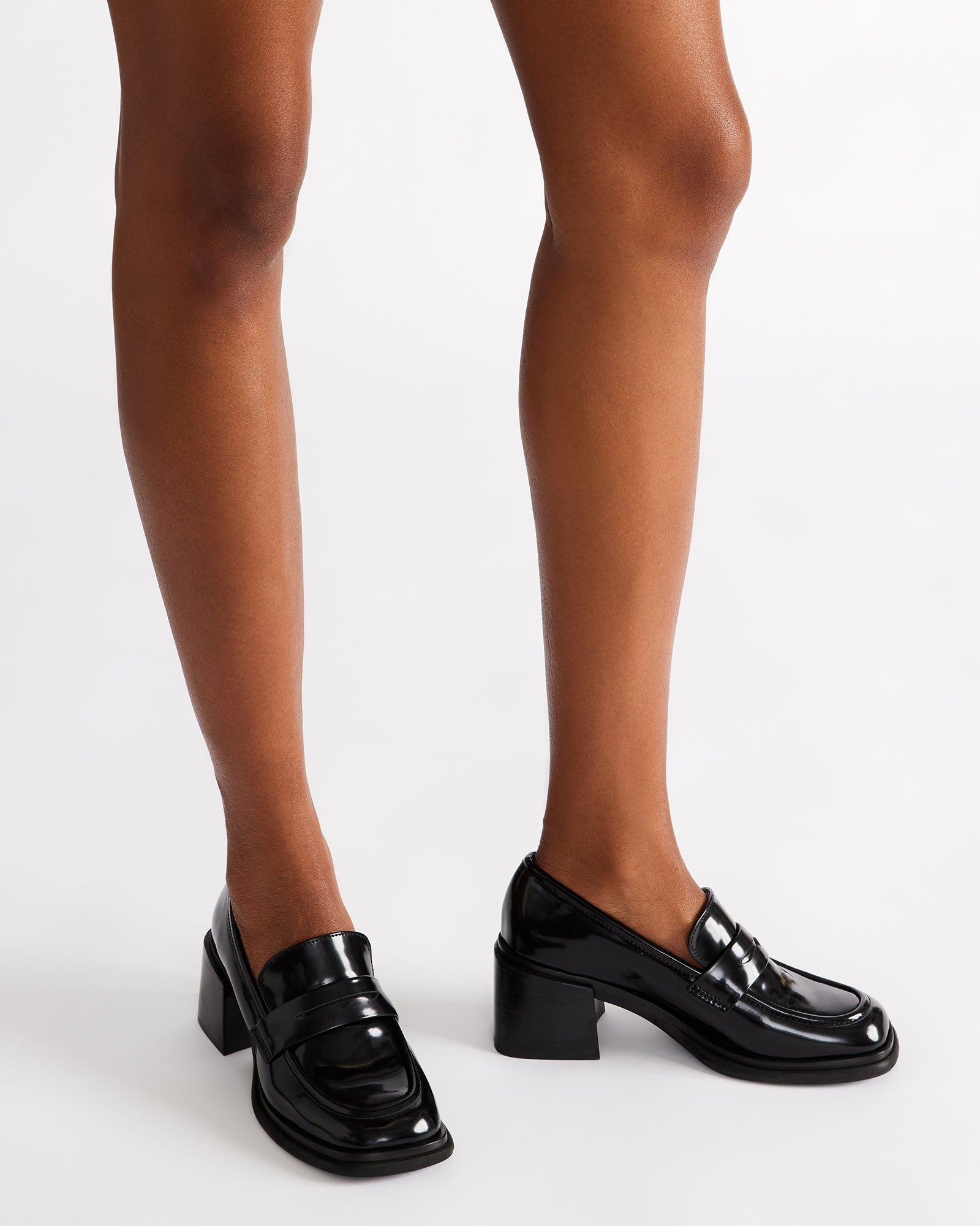 Styled outfit featuring BAXTER bone leather loafers with a modern look