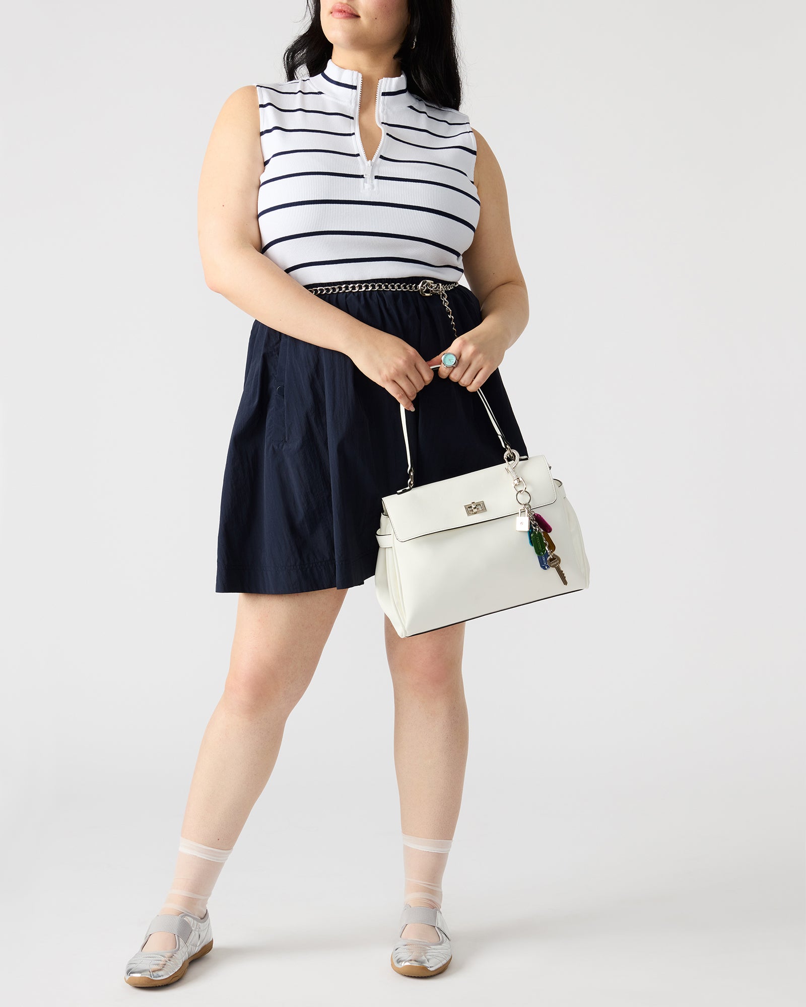Interior view of ALFEE shoulder bag showcasing spacious compartments.