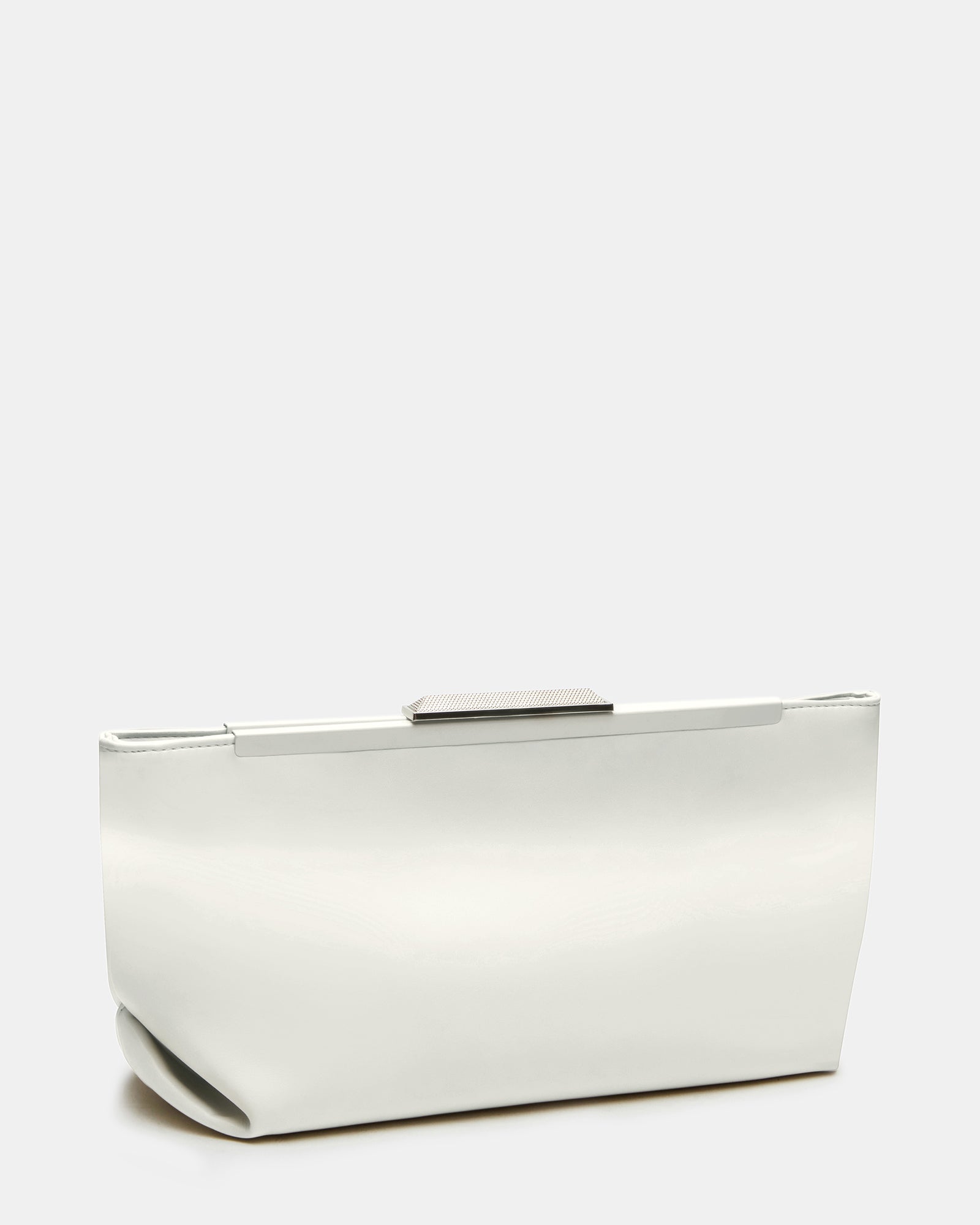 Styled clutch on a cafe table, ideal for bags for women clutch looks in urban environments