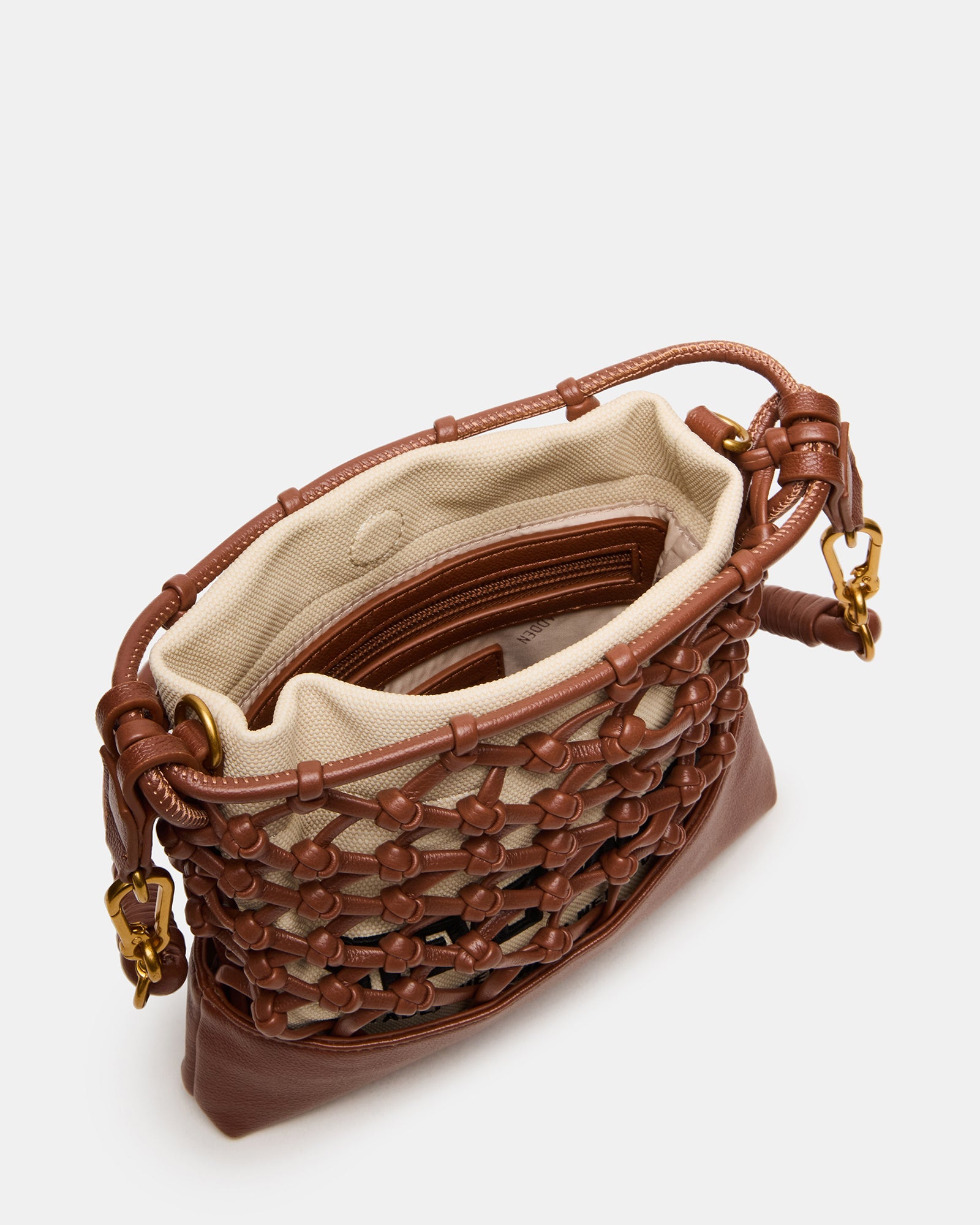Side angle of the Arda crossbody bag with removable pouch for added storage.