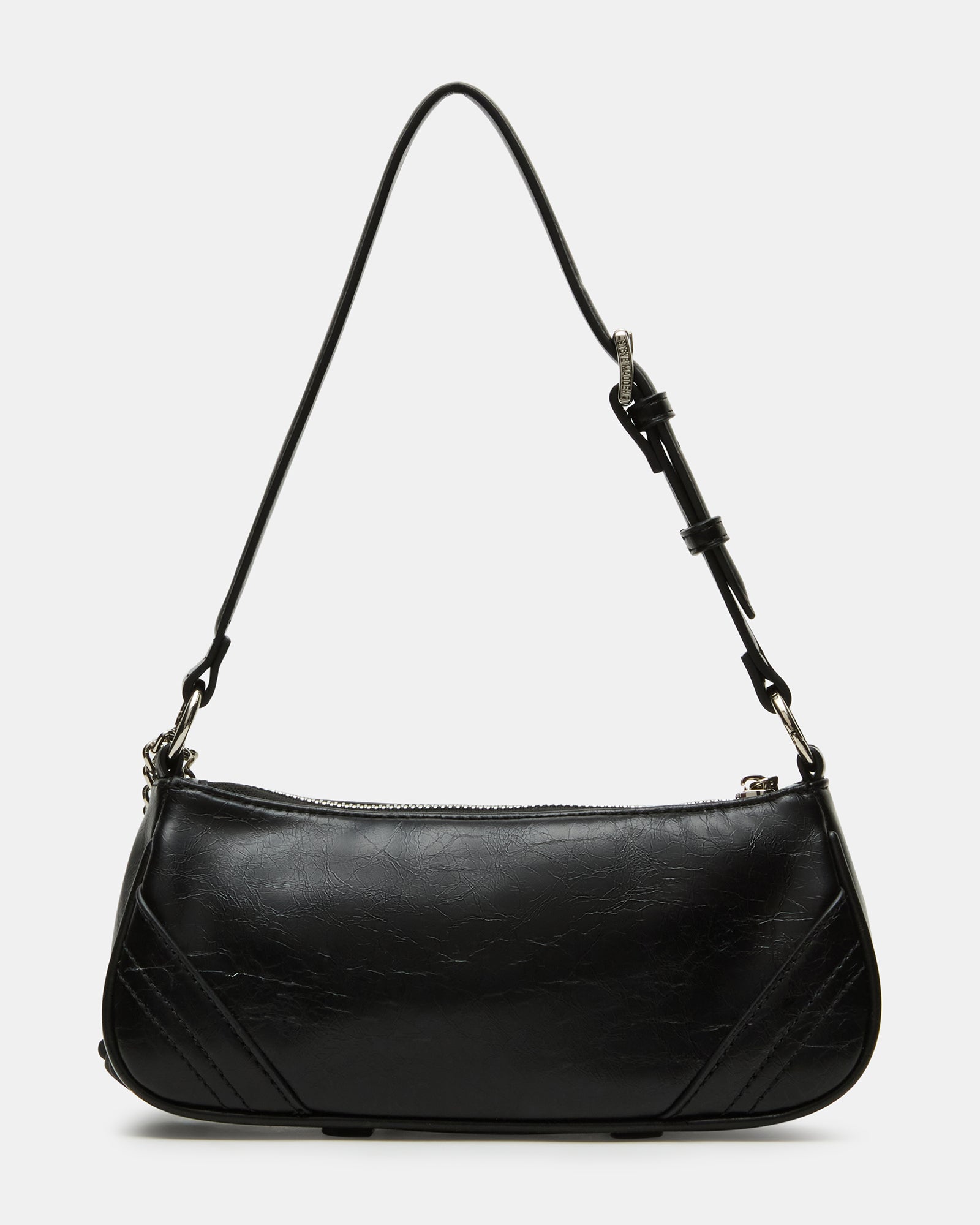 BECKA bag worn crossbody style on a model walking through Manhattan streets