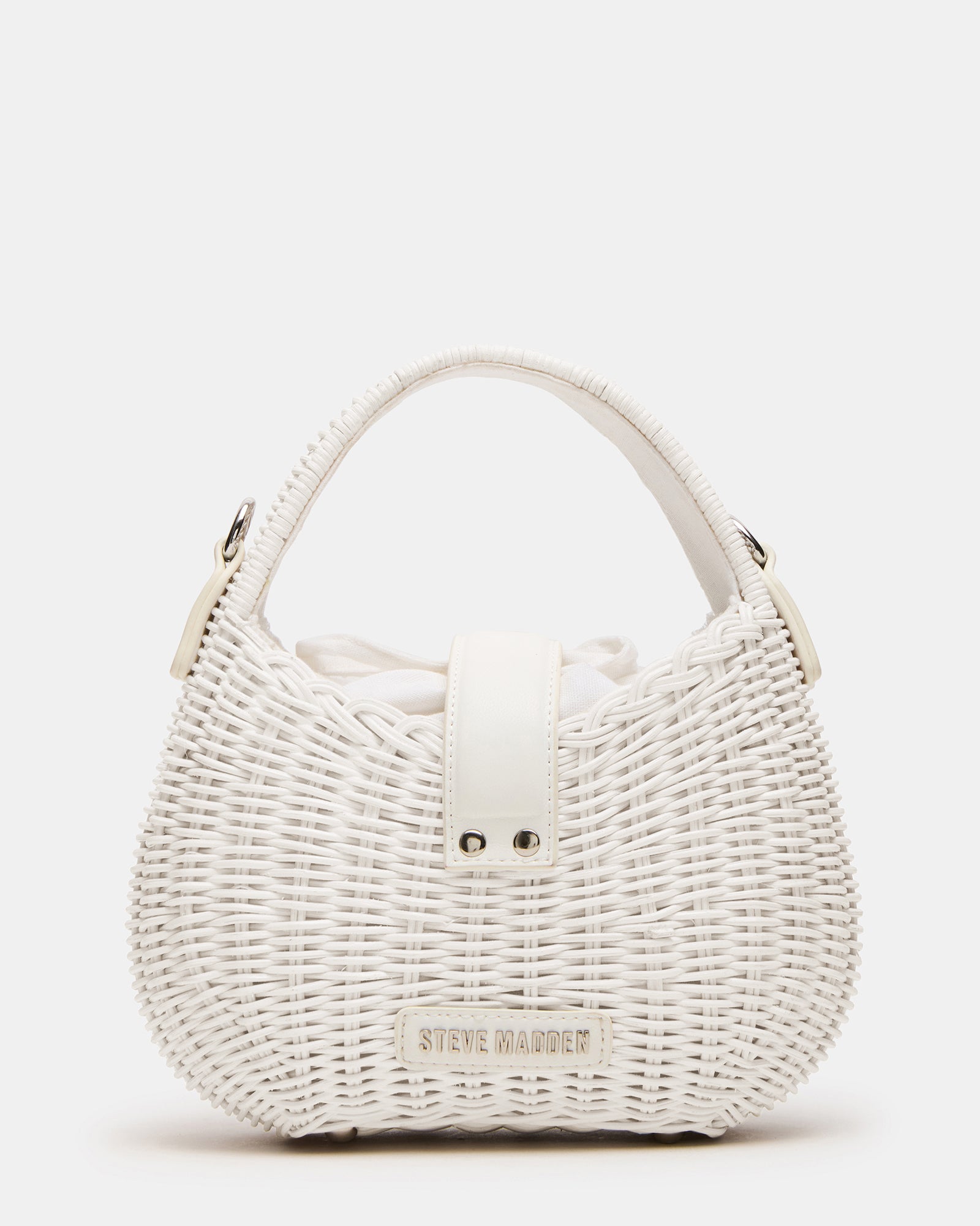 Canela mini bag displayed with duster bag for protection and style