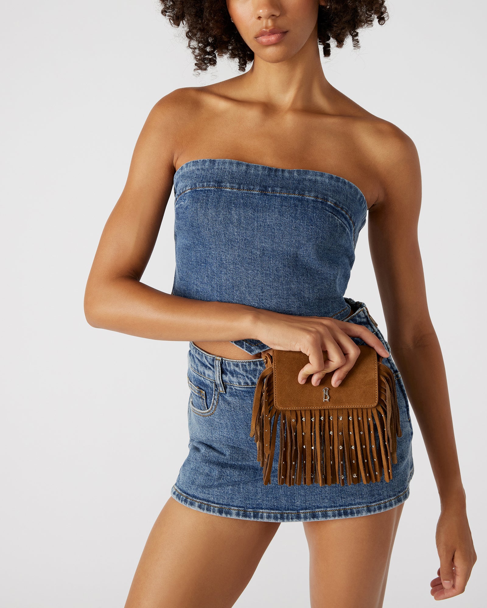 Model wearing the crossbody bag on a weekend outing
