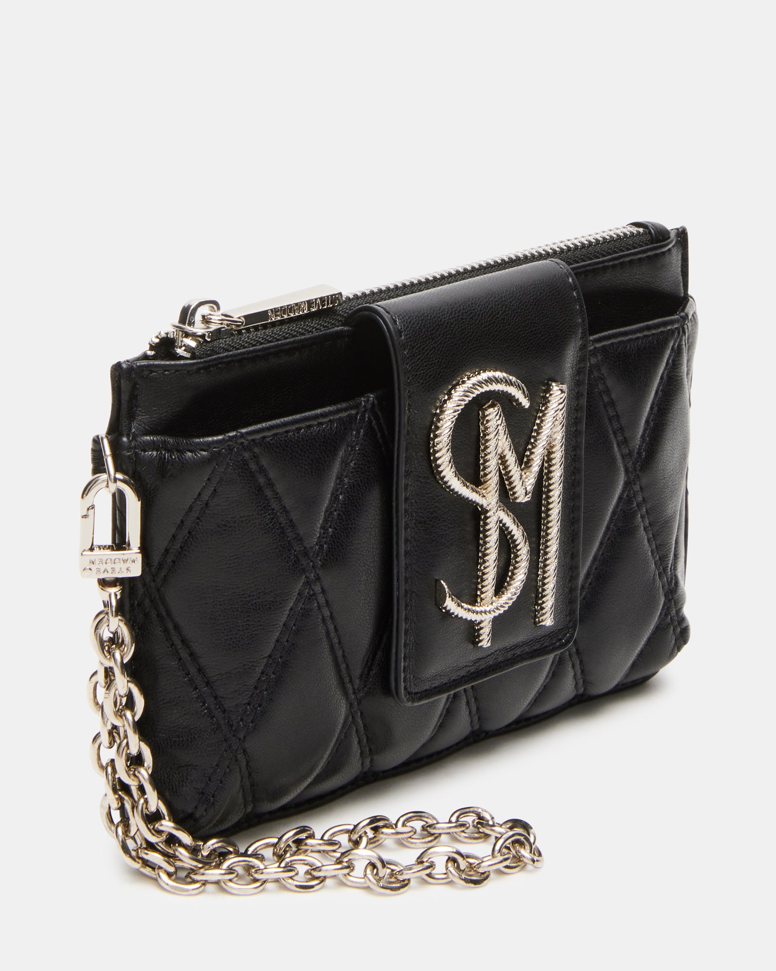 Stylish woman holding wallet in downtown setting