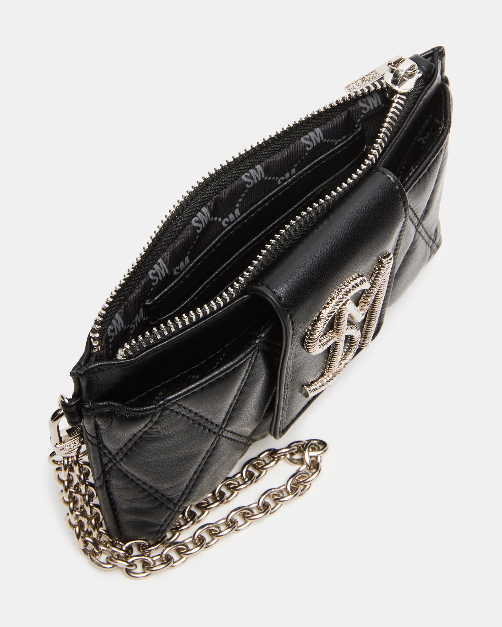 Close-up of black quilted wallet showing gold logo and chain detail
