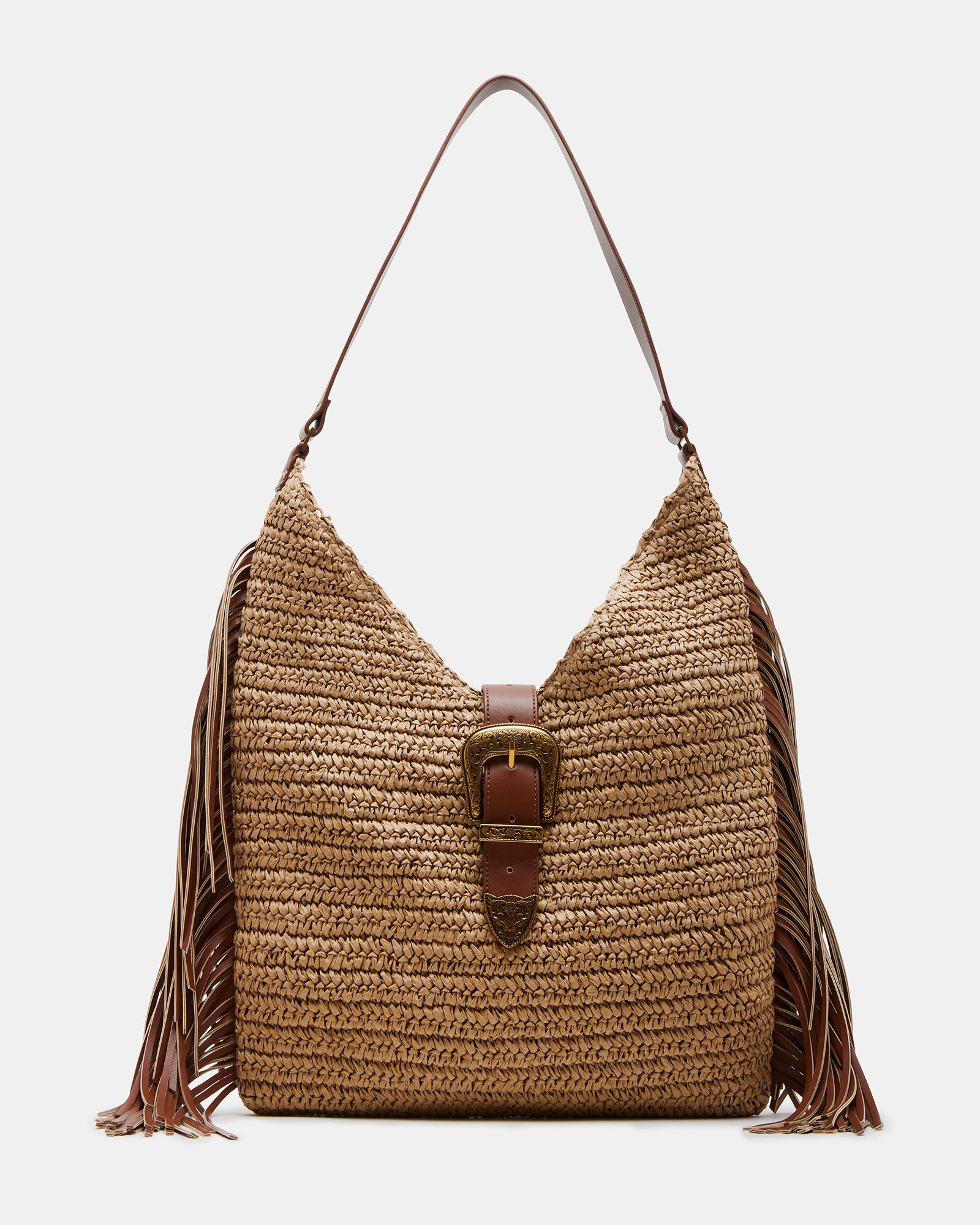 Coltie fringe tote bag displayed in a park setting, showcasing its design.