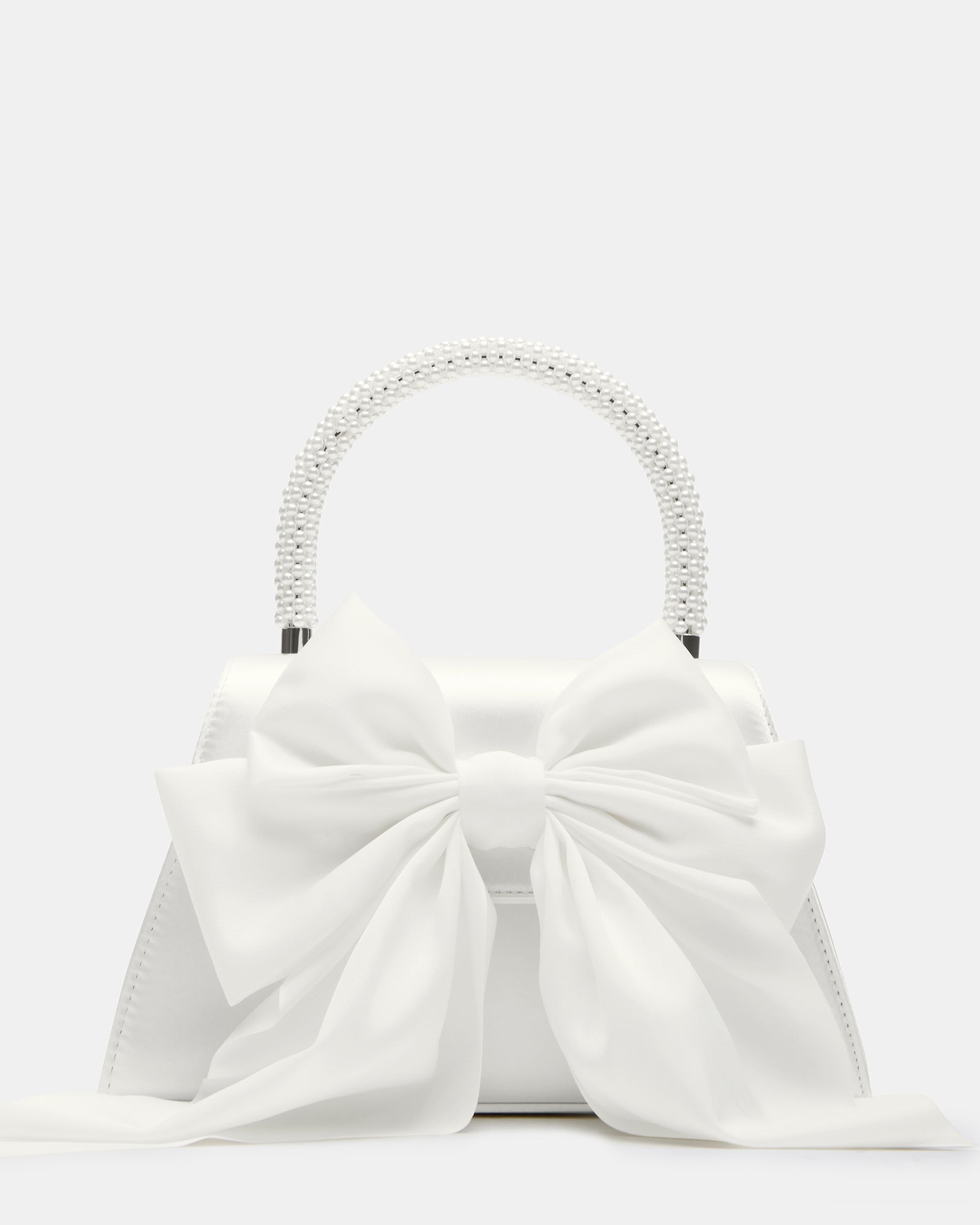 Close-up of silver evening clutch bag with satin bow.