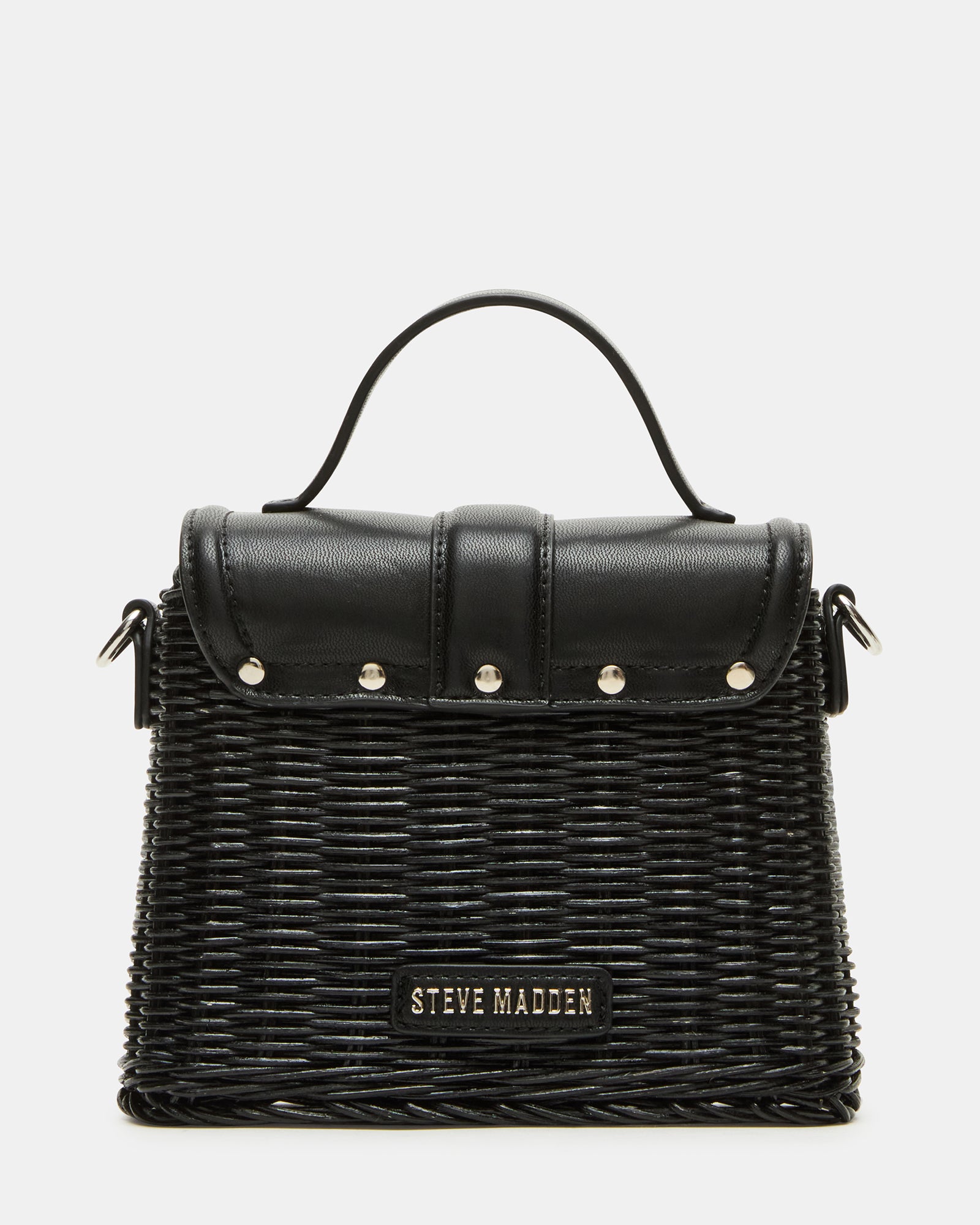 Model carrying the bag as a crossbody with strap adjusted to 23 inches