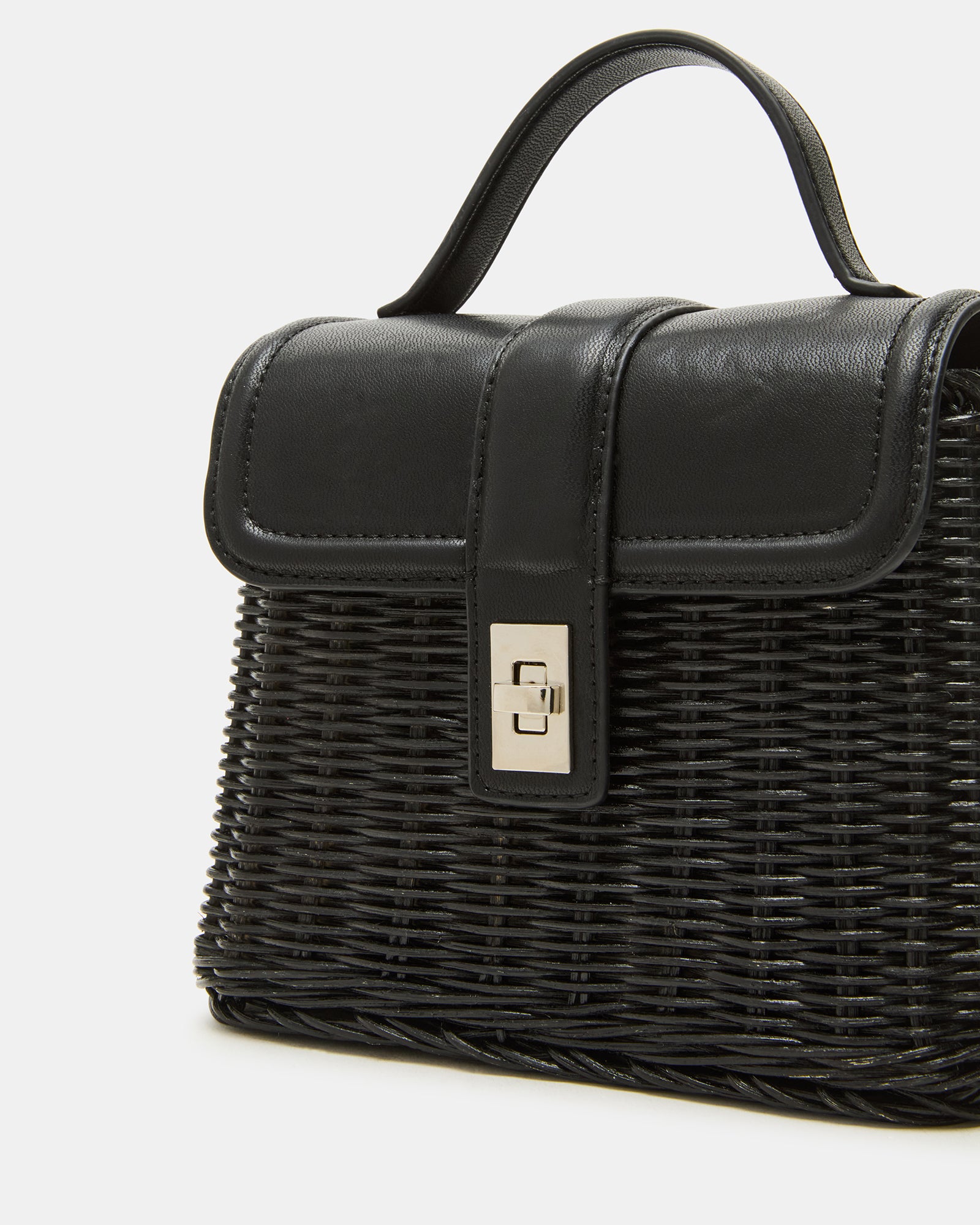 Model carrying the bag as a crossbody with strap adjusted to 23 inches