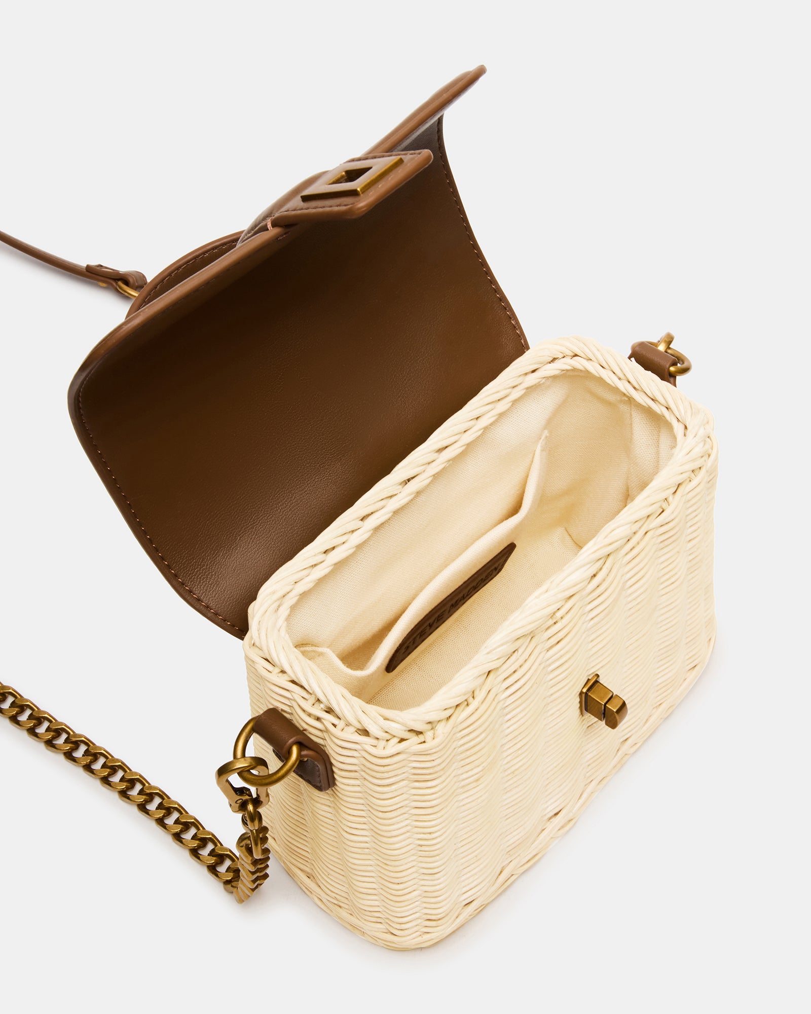 Wicker and leather strap detail on the Cristy top-handle bag