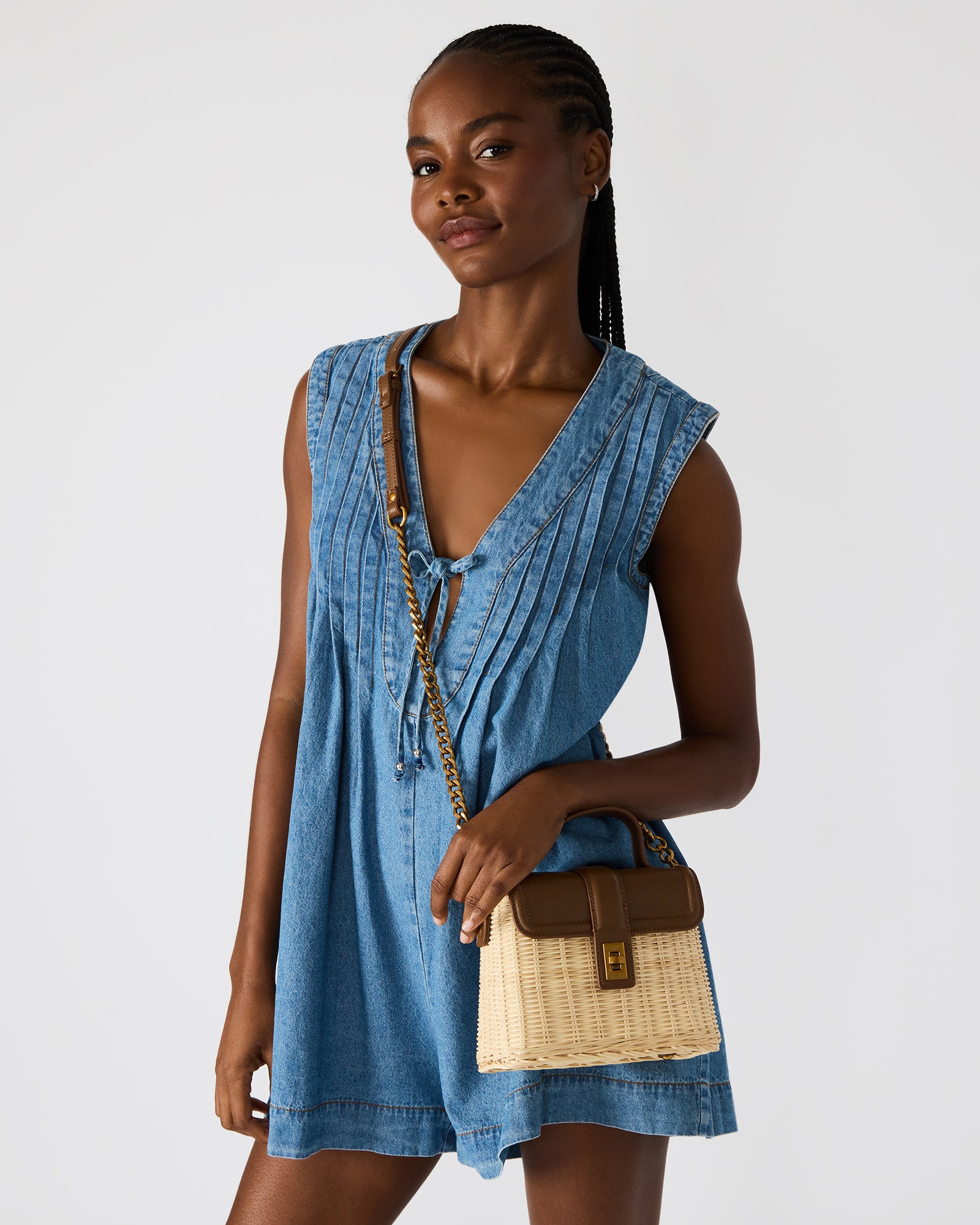 Wicker and leather strap detail on the Cristy top-handle bag