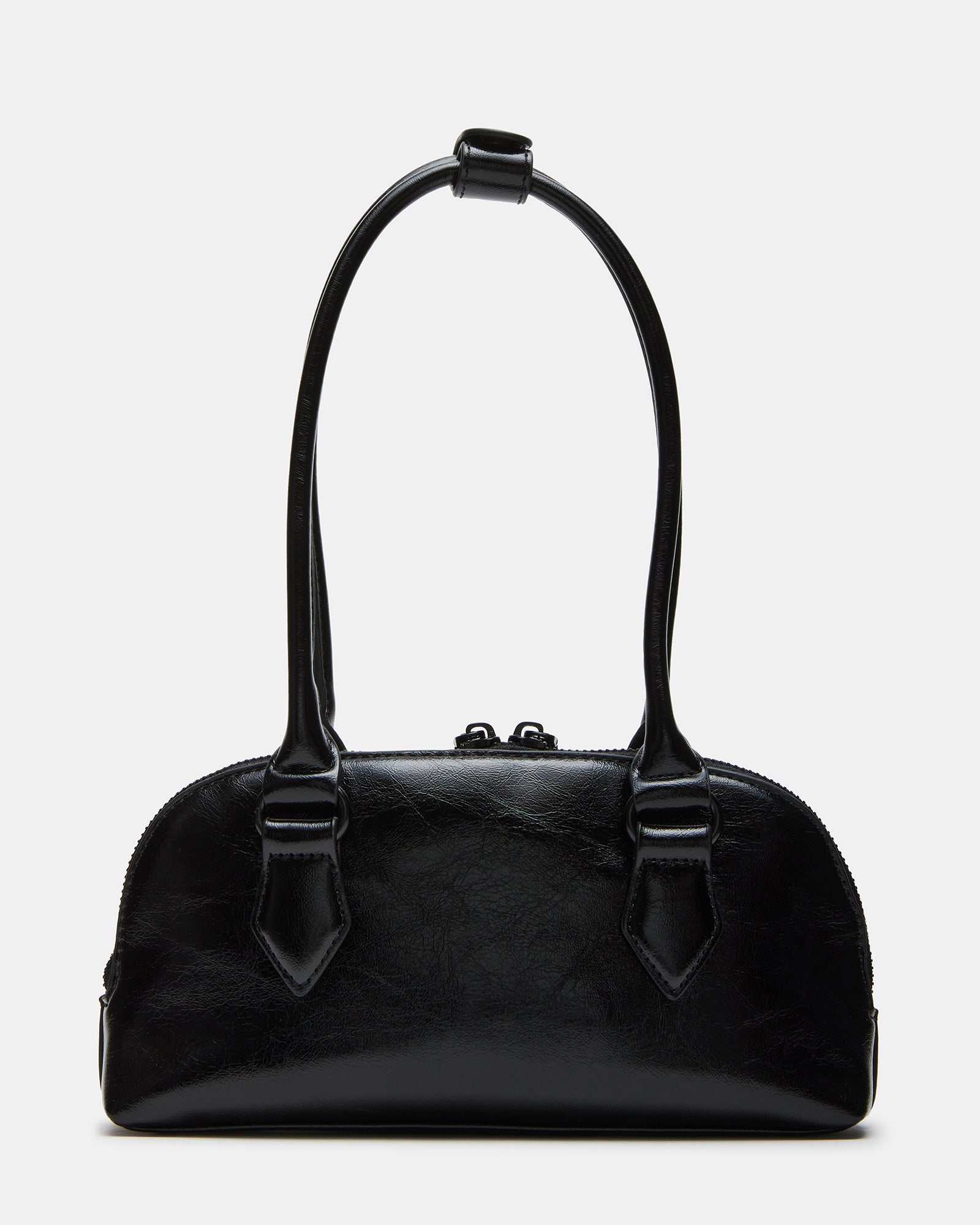 Lifestyle shot of the coach teri shoulder bag being used in an urban setting.
